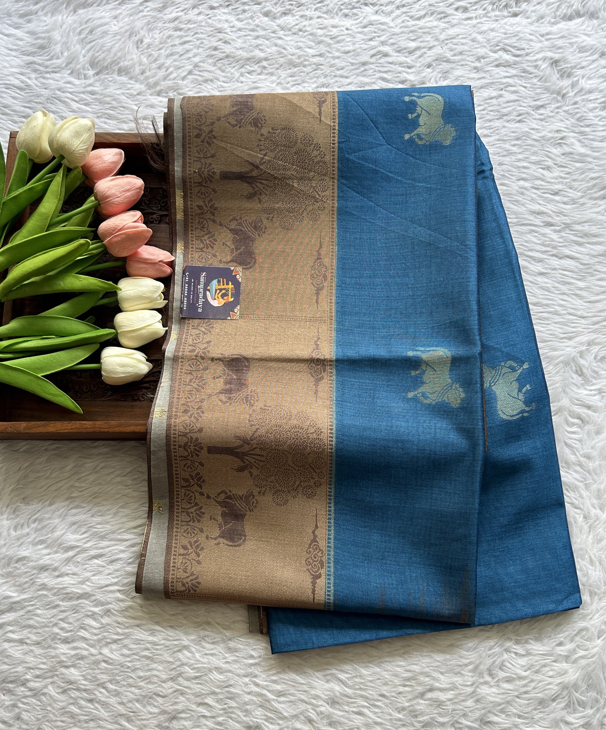 Semi Tussar Saree Blue Colored complemented with a Brown Color Zari Border. - Sampradaya Designer Studio