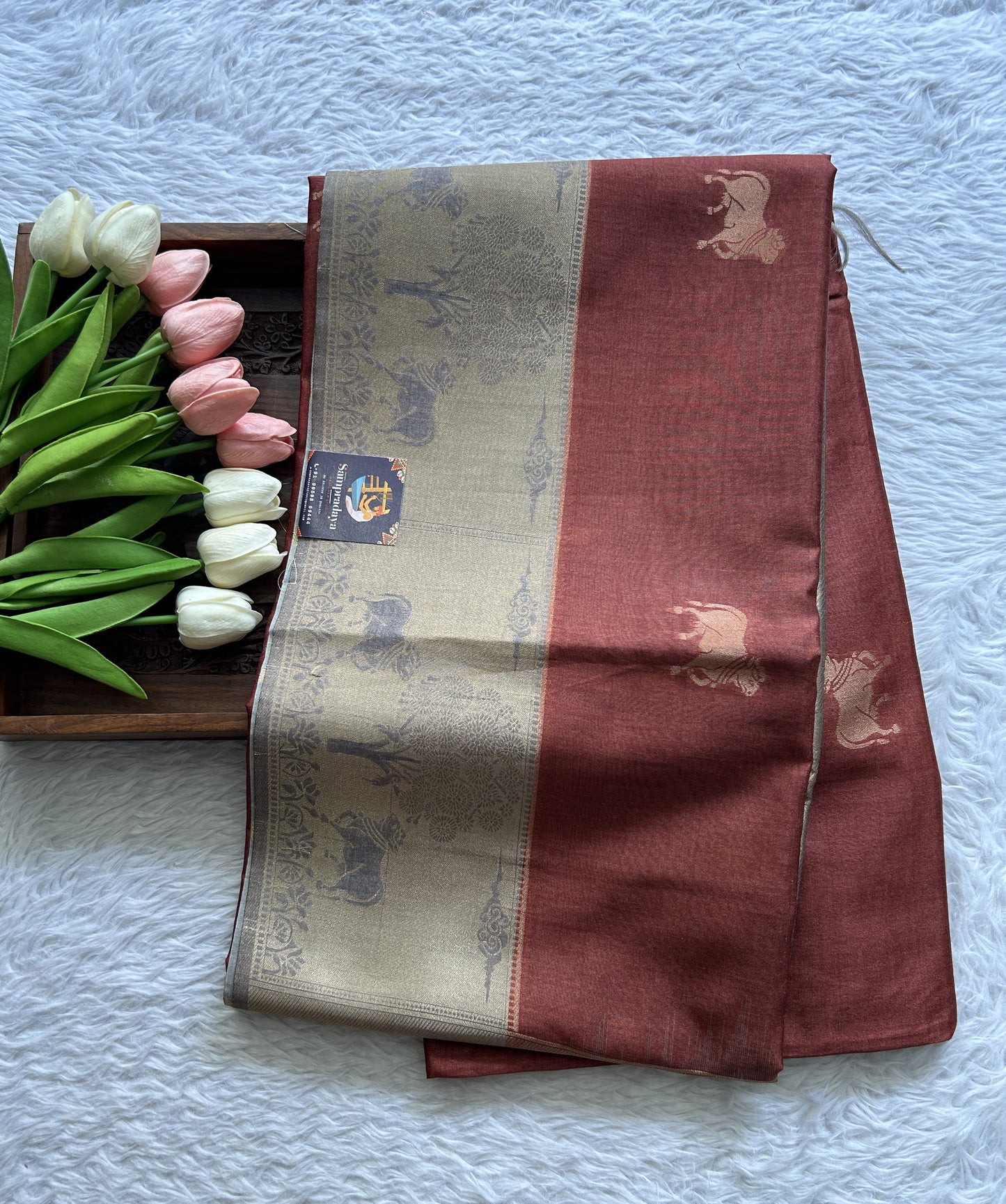 Semi Tussar Saree Rust Colored complemented with a Gray Color Zari Border. - Sampradaya Designer Studio