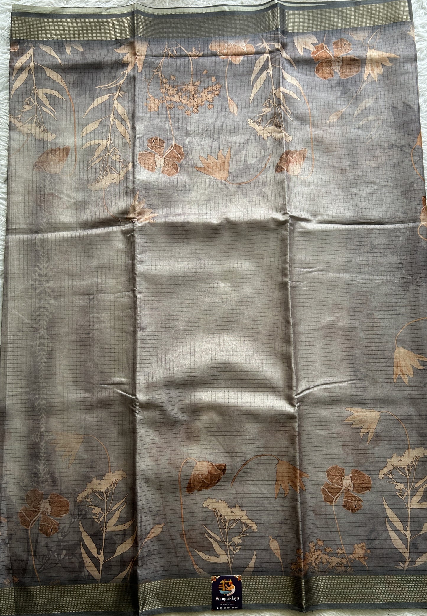 Semi Tussar Saree Gray Colored complemented with a Zari Border. - Sampradaya Designer Studio