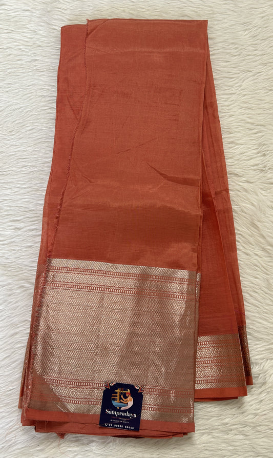 Mangalagiri Plain Pattu Saree Coral colored Saree complemented with a Gold Mangalagiri  Border - Sampradaya Designer Studio