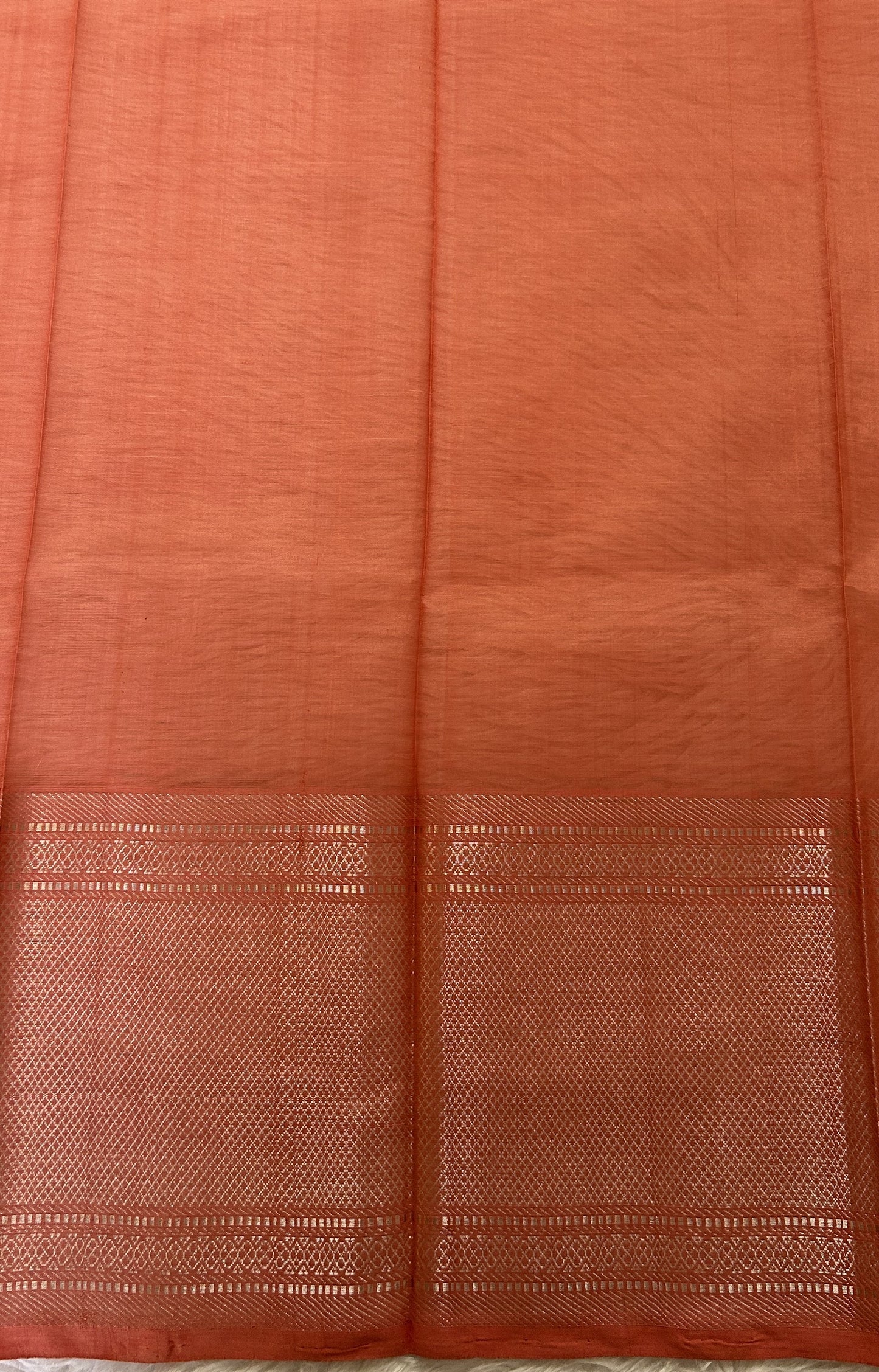 Mangalagiri Plain Pattu Saree Coral colored Saree complemented with a Gold Mangalagiri  Border - Sampradaya Designer Studio