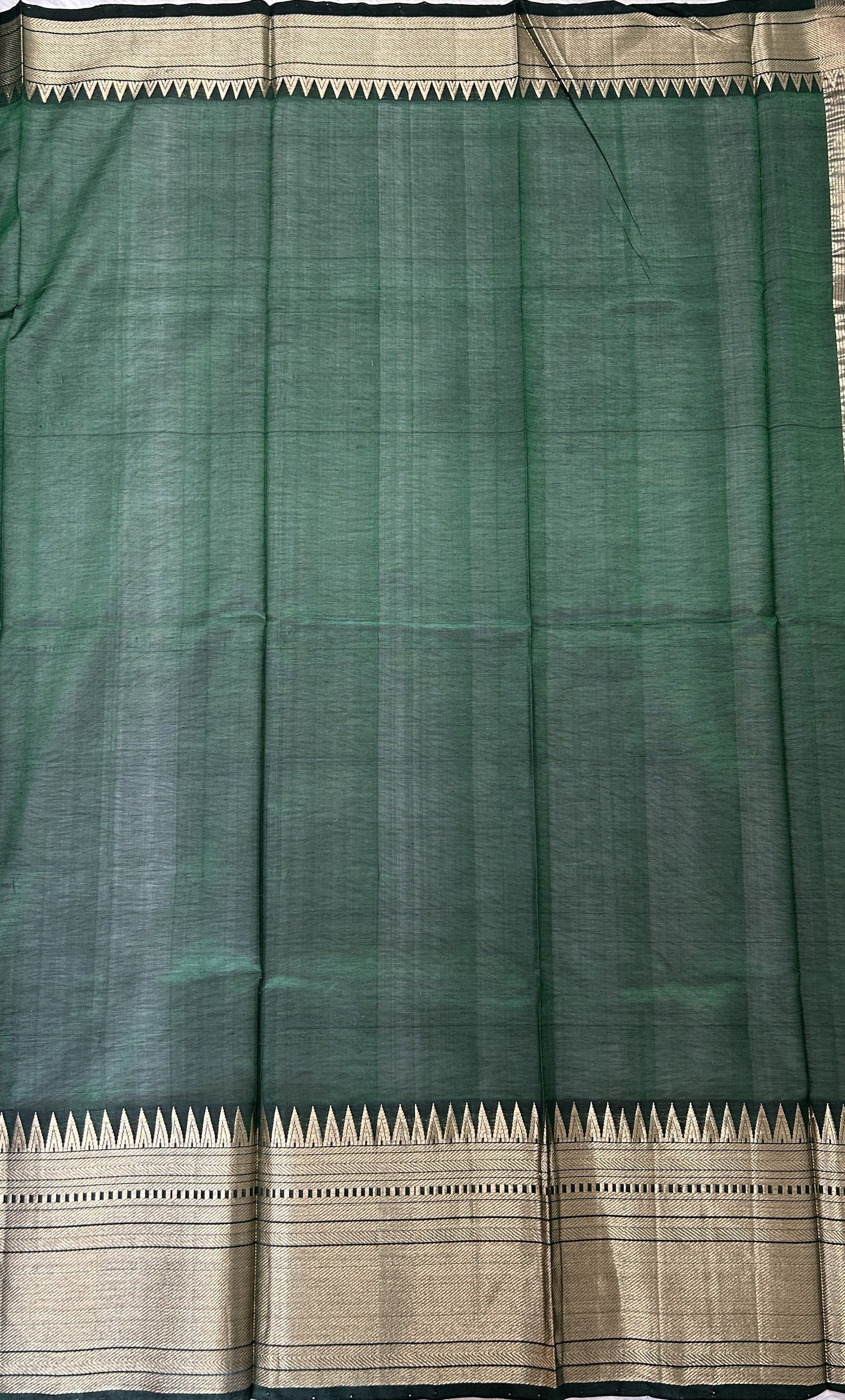 Mangalagiri Plain Pattu Saree Bottle Green colored Saree complemented with a Gold Mangalagiri  Border - Sampradaya Designer Studio