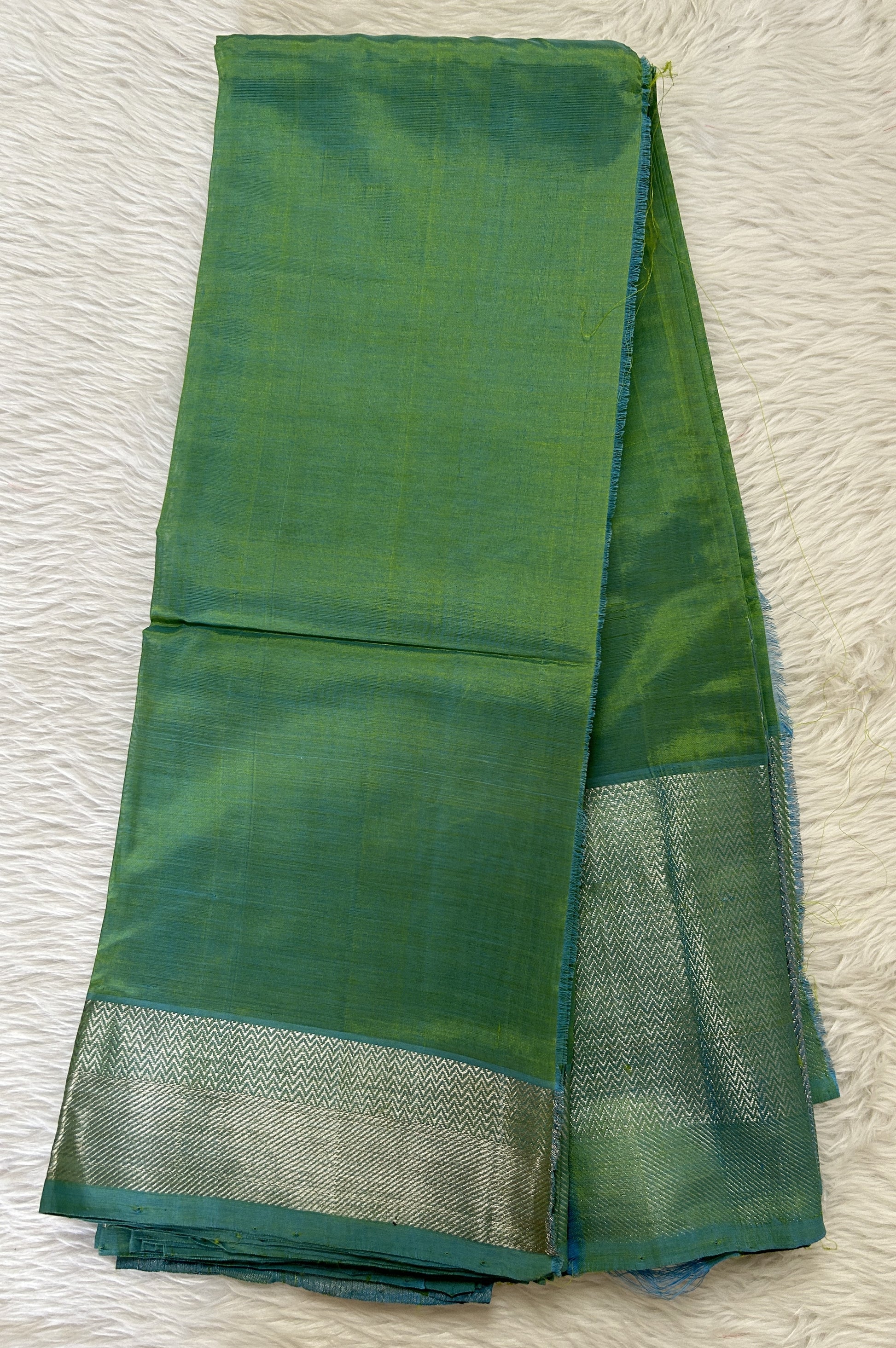 Mangalagiri Plain Pattu Saree Green colored Saree complemented with a Silver Mangalagiri Border - Sampradaya Designer Studio