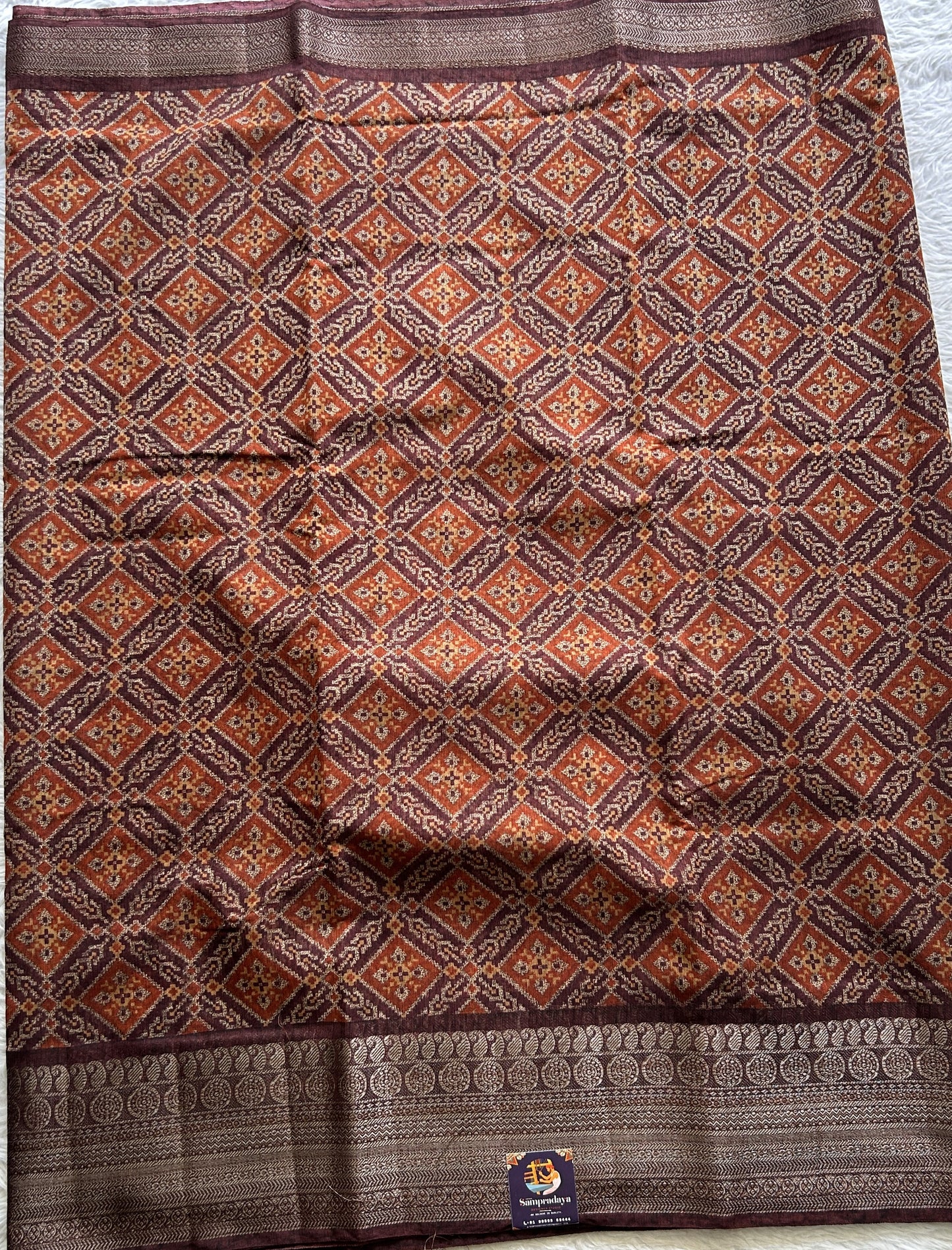 Maheshwari Chanderi Cotton Saree Brown Colored Complemented with a Zari Border. - Sampradaya Designer Studio