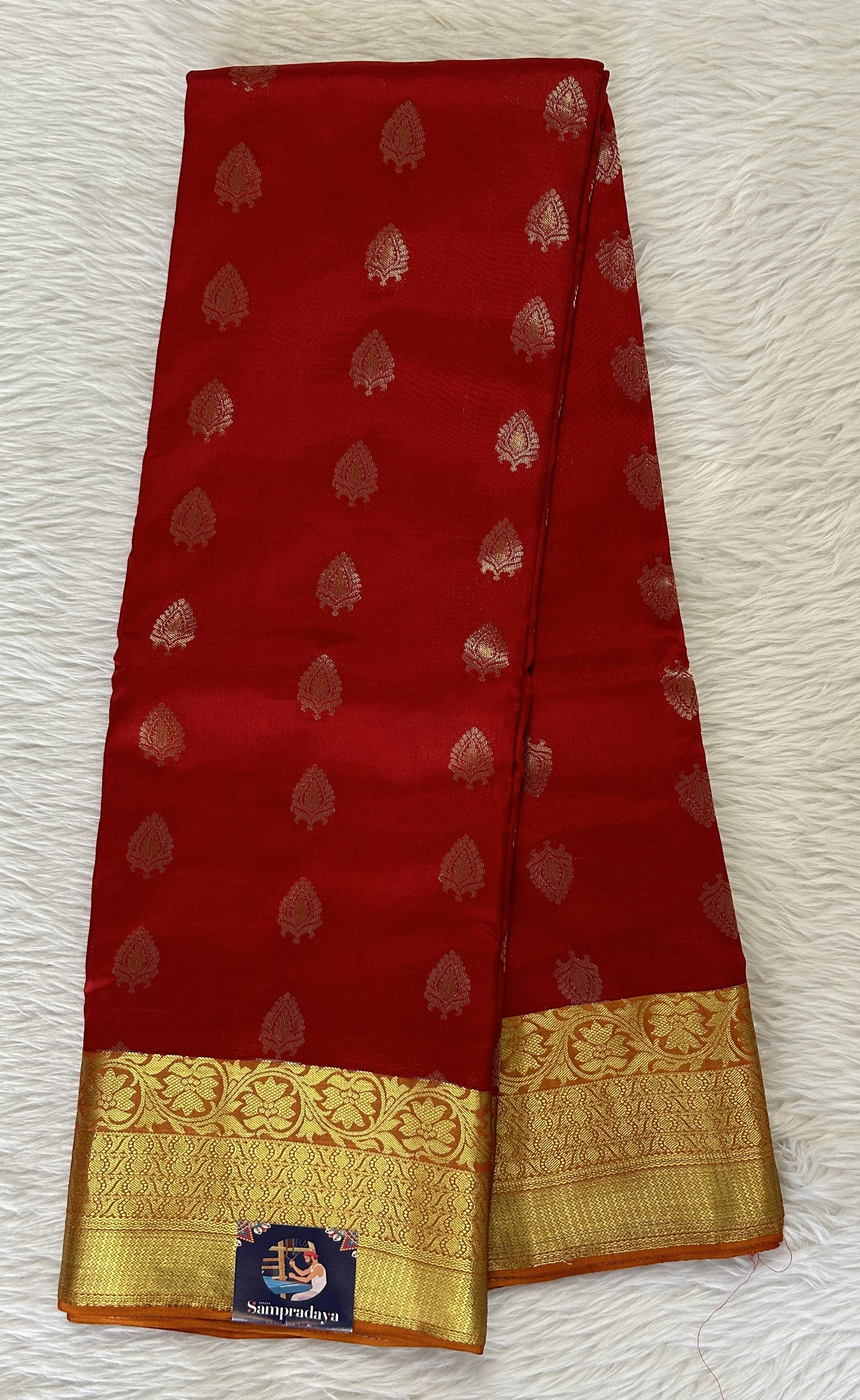 Kanjivaram Powerloom Silk Saree Red colored Saree complemented with a Orange Colored Gold Kanchi border. - Sampradaya Designer Studio