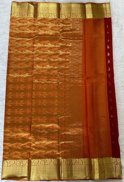 Kanjivaram Powerloom Silk Saree Red colored Saree complemented with a Orange Colored Gold Kanchi border. - Sampradaya Designer Studio