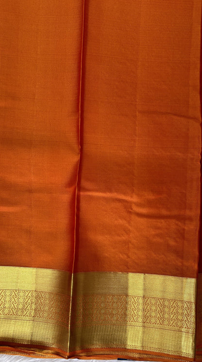 Kanjivaram Powerloom Silk Saree Red colored Saree complemented with a Orange Colored Gold Kanchi border. - Sampradaya Designer Studio