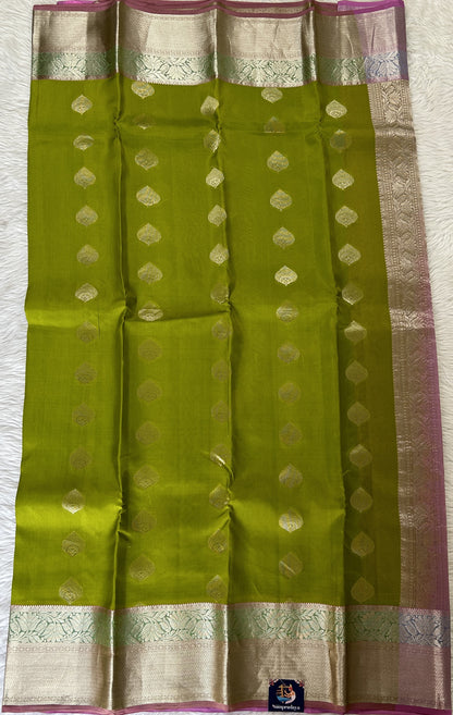 Kanjivaram Powerloom Silk Saree Parrot Green colored Saree complemented with a Baby Pink Colored Silver Kanchi border. - Sampradaya Designer Studio