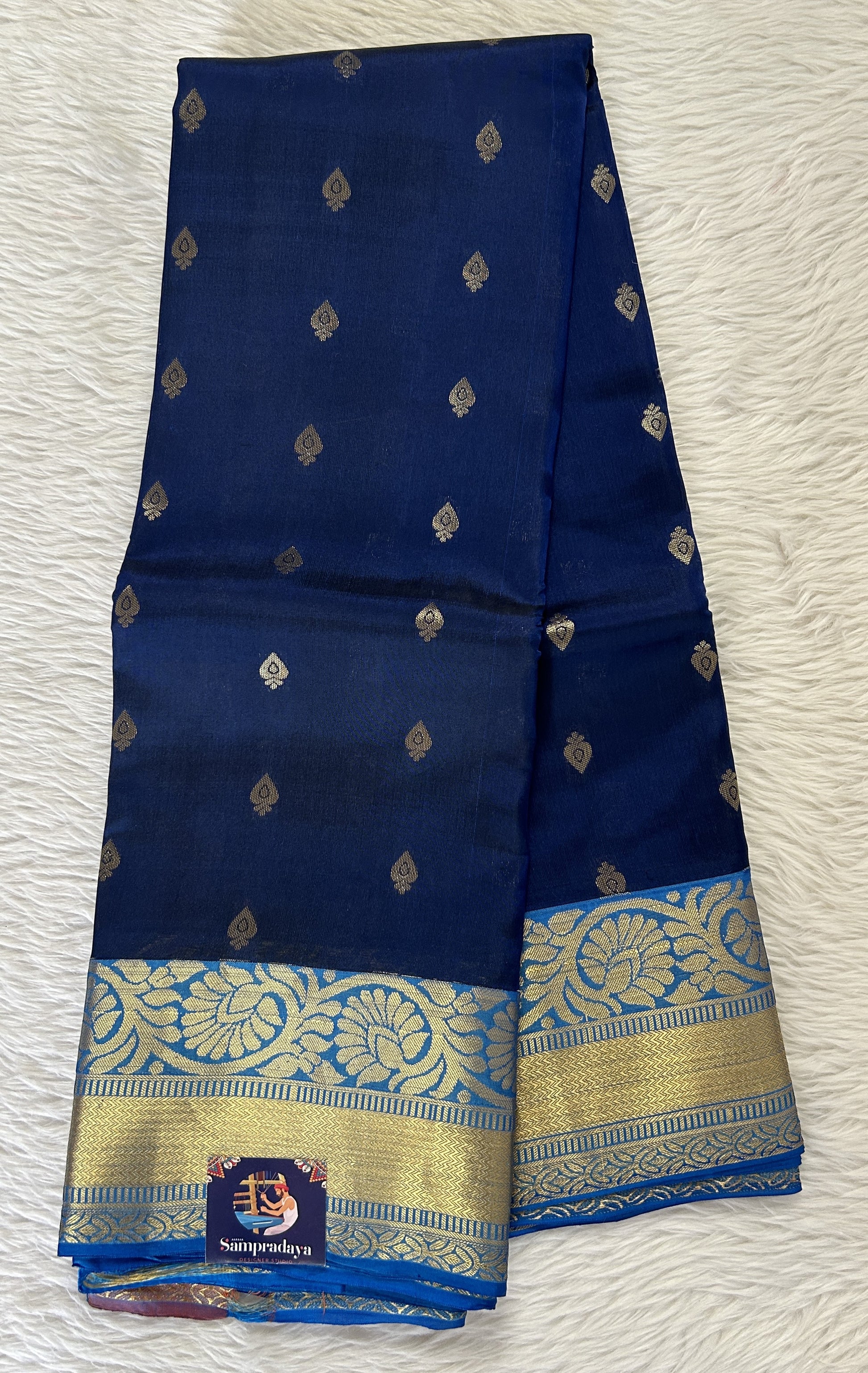 Kanjivaram Powerloom Silk Saree Carbon Blue colored Saree complemented with a Blue Colored Gold Kanchi border. - Sampradaya Designer Studio