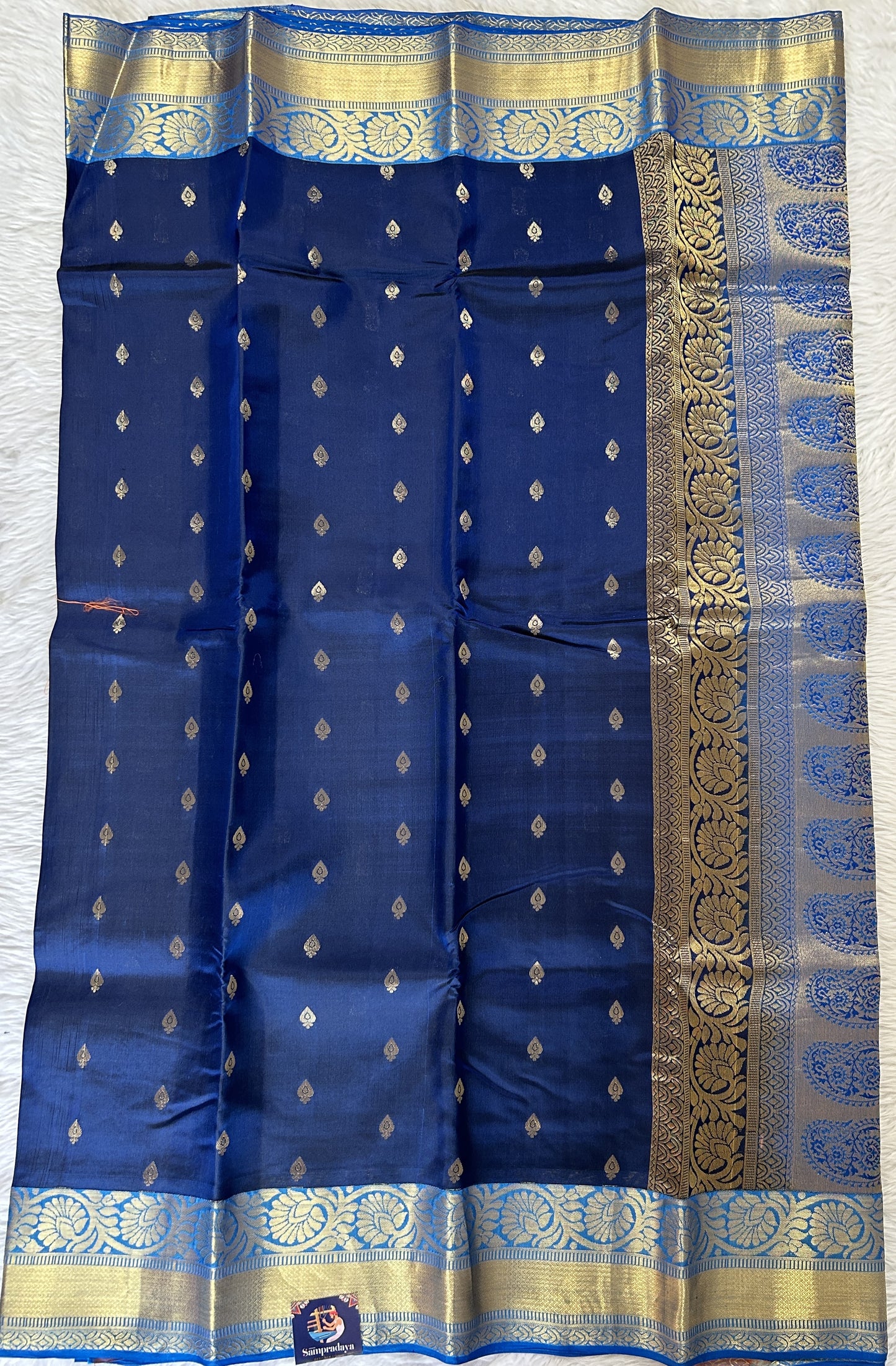 Kanjivaram Powerloom Silk Saree Carbon Blue colored Saree complemented with a Blue Colored Gold Kanchi border. - Sampradaya Designer Studio