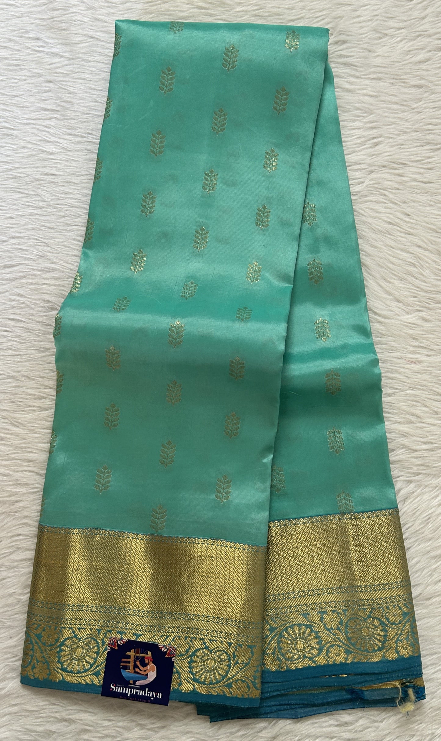 Kanjivaram Powerloom Silk Saree Ice Blue colored Saree complemented with a Blue Colored Gold Kanchi border. - Sampradaya Designer Studio