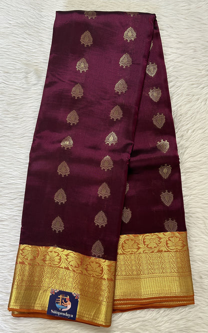 Kanjivaram Powerloom Silk Saree Magenta colored Saree complemented with a Orange Colored Gold Kanchi border. - Sampradaya Designer Studio