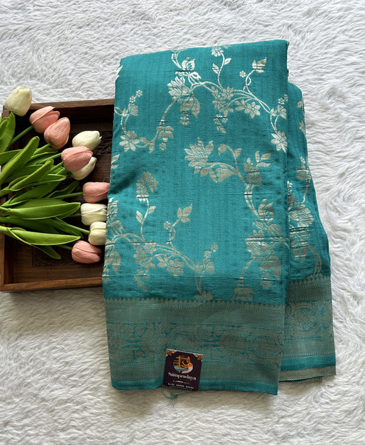 Semi Georgette Saree Turquoise Blue Colored Complemented with a Zari Border. - Sampradaya Designer Studio