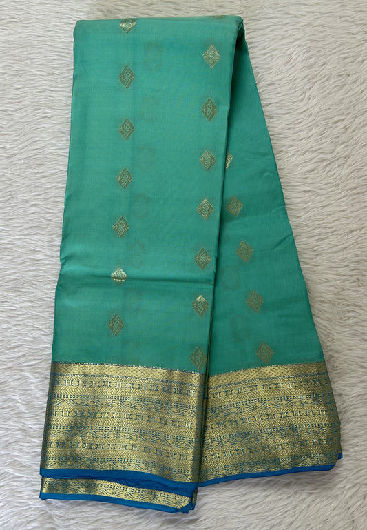 Kanjivaram Powerloom Silk Saree Aqua Blue colored Saree complemented with a Dark Blue Colored Gold Kanchi border. - Sampradaya Designer Studio