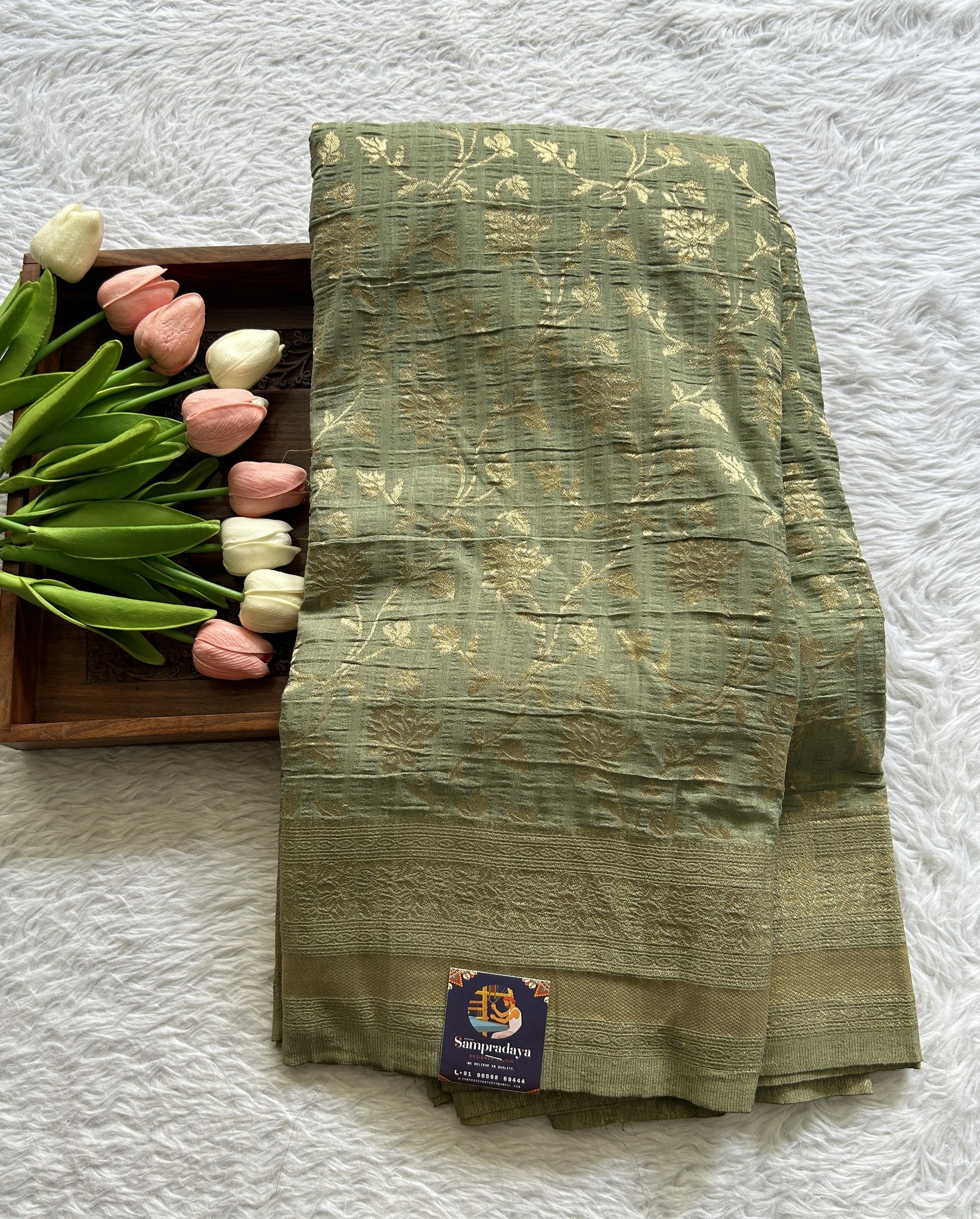 Semi Georgette Saree Light Pista Green Colored Complemented with a Zari Border. - Sampradaya Designer Studio