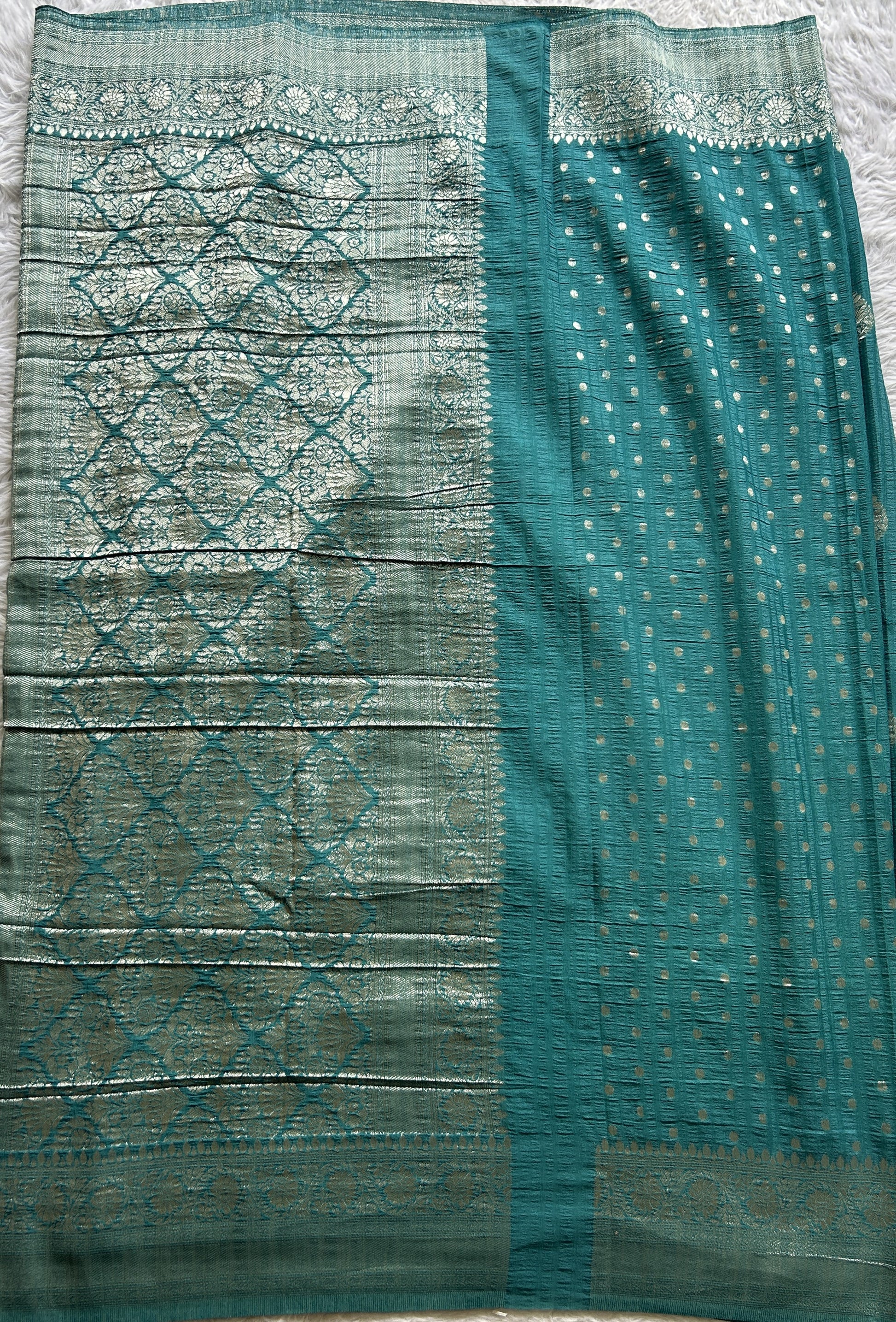 Semi Georgette Saree Teal Blue Colored Complemented with a Zari Border. - Sampradaya Designer Studio