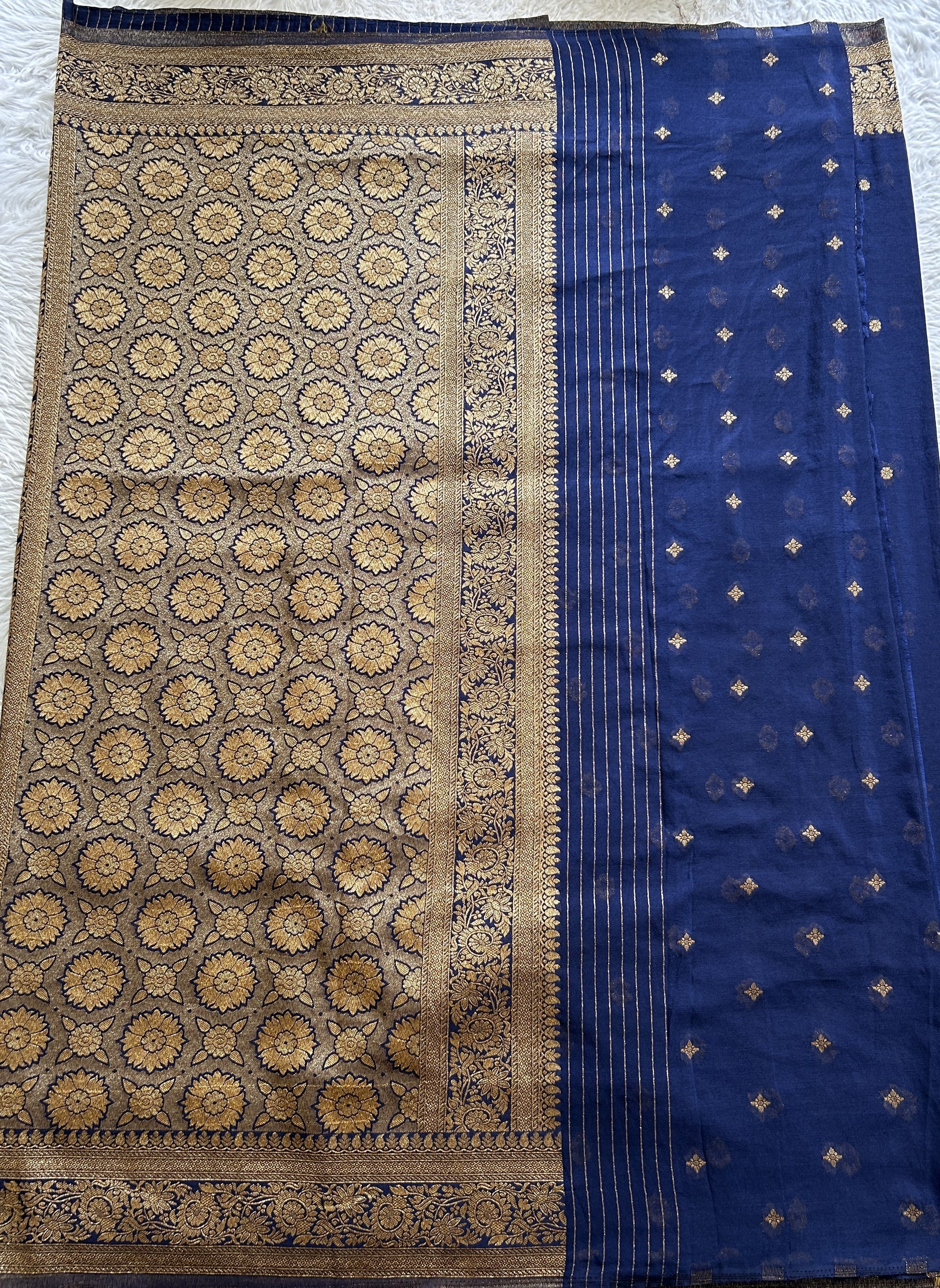 Semi Georgette Saree Navy Blue Colored Complemented with a Zari Border. - Sampradaya Designer Studio