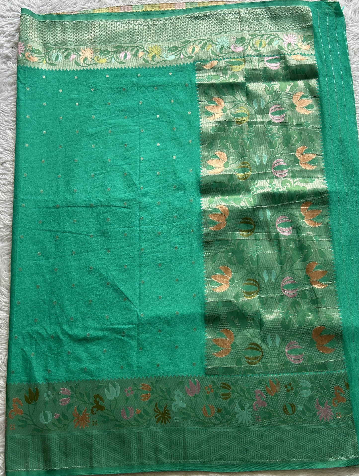 Semi Georgette Saree Aqua Green Colored Complemented with a Zari Border. - Sampradaya Designer Studio