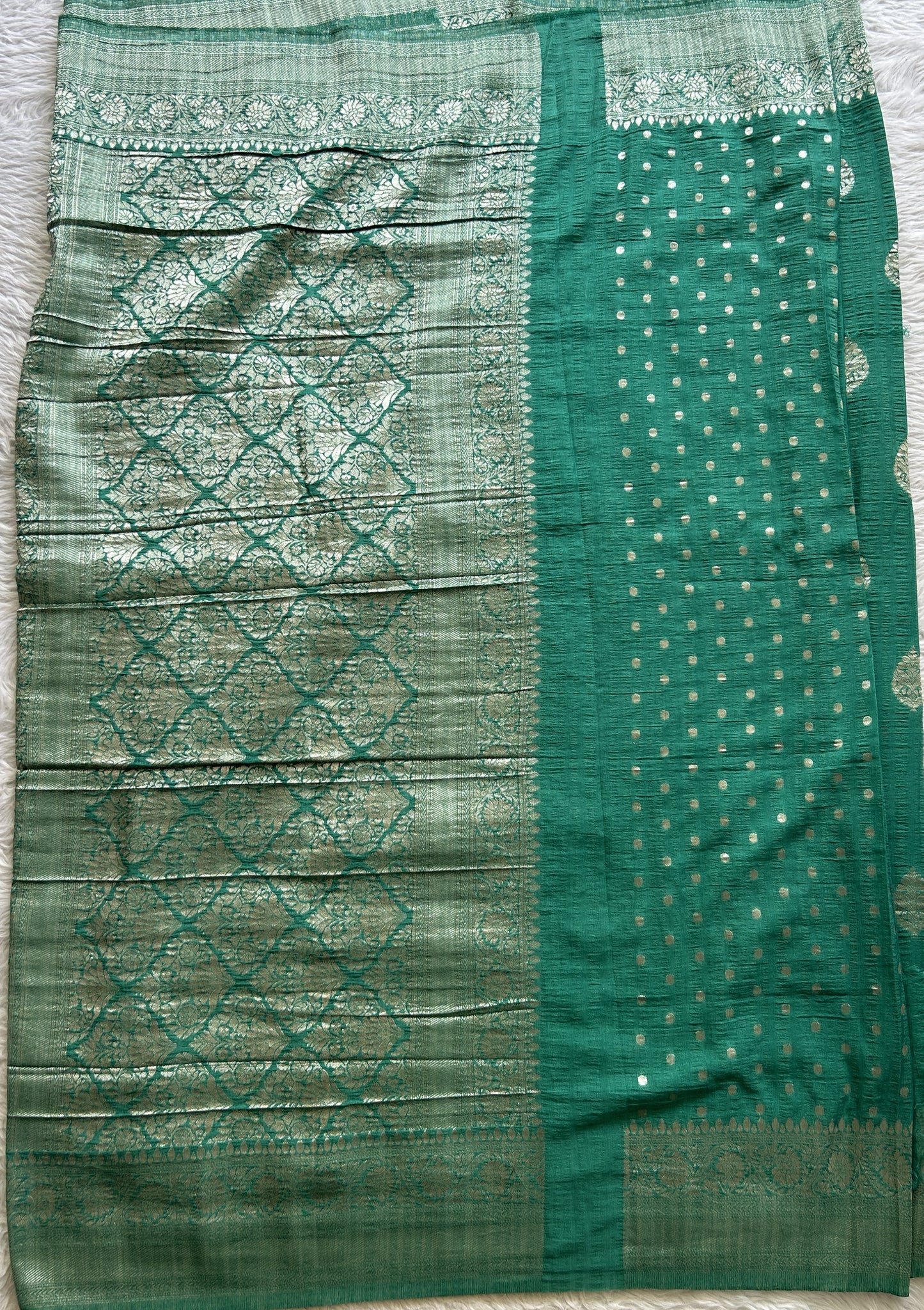 Semi Georgette Saree Aqua Green Colored Complemented with a Zari Border. - Sampradaya Designer Studio