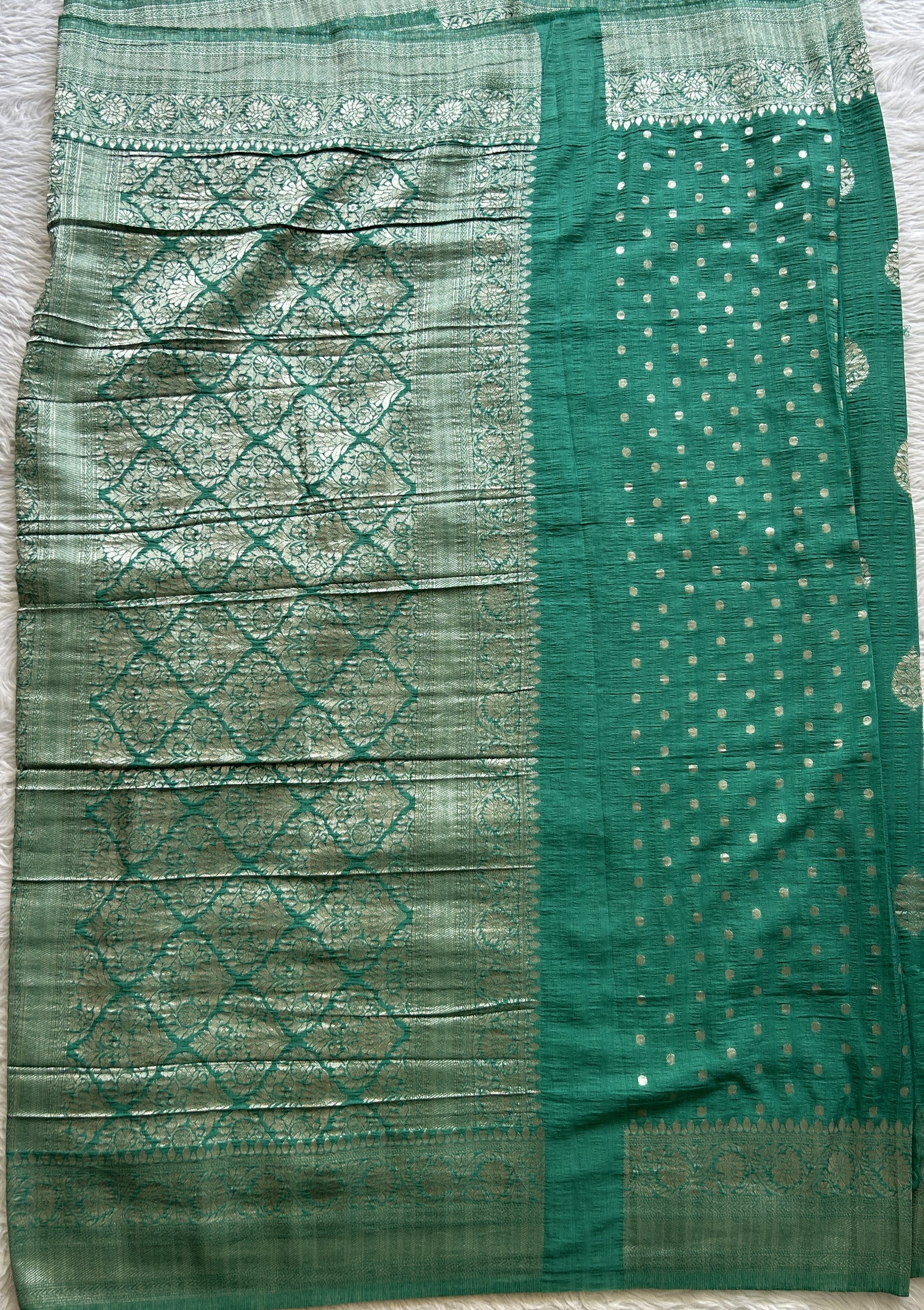 Semi Georgette Saree Aqua Green Colored Complemented with a Zari Border. - Sampradaya Designer Studio