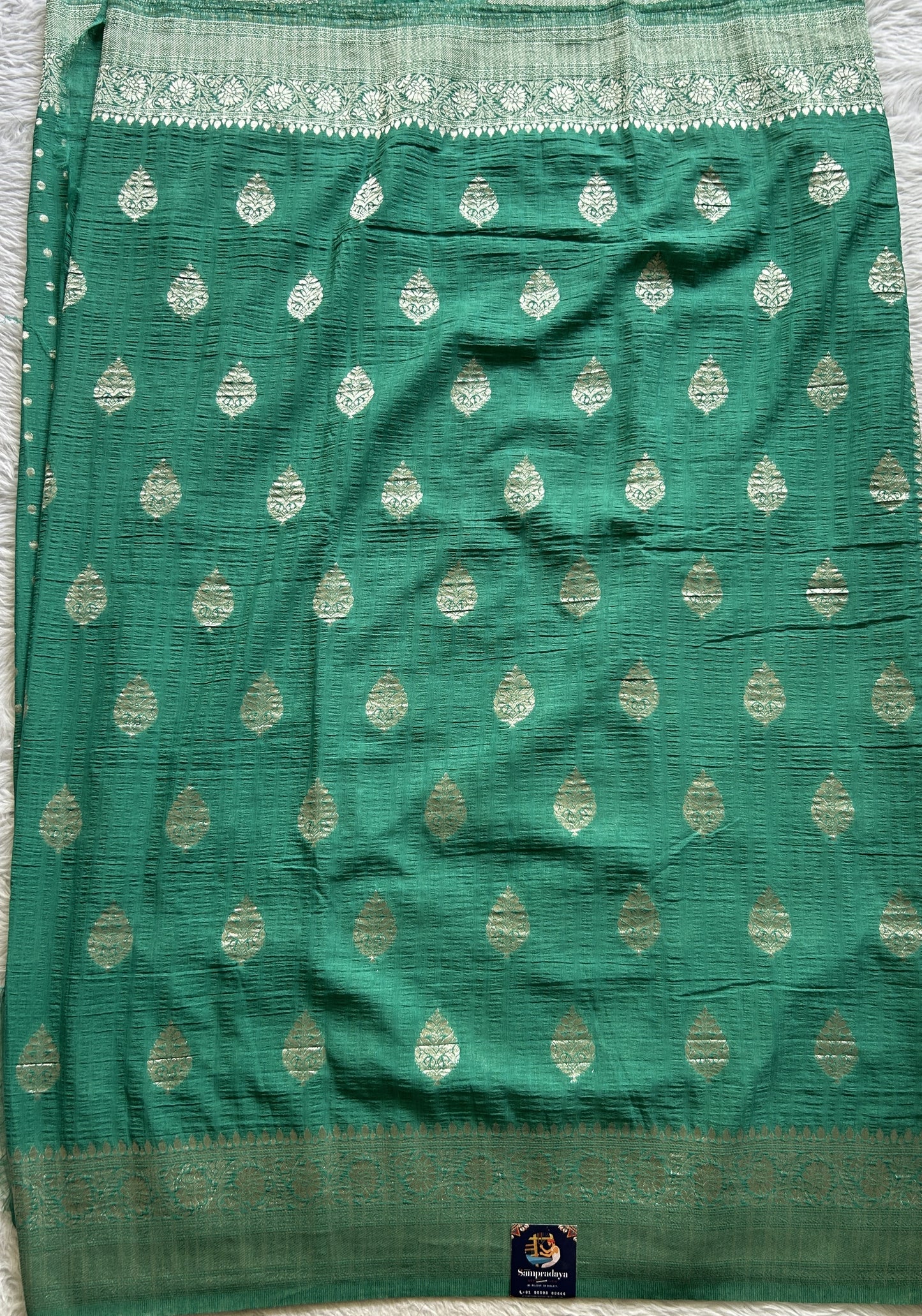 Semi Georgette Saree Aqua Green Colored Complemented with a Zari Border. - Sampradaya Designer Studio