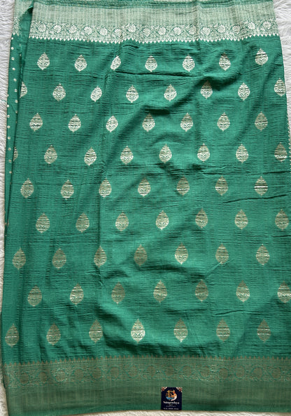 Semi Georgette Saree Aqua Green Colored Complemented with a Zari Border. - Sampradaya Designer Studio