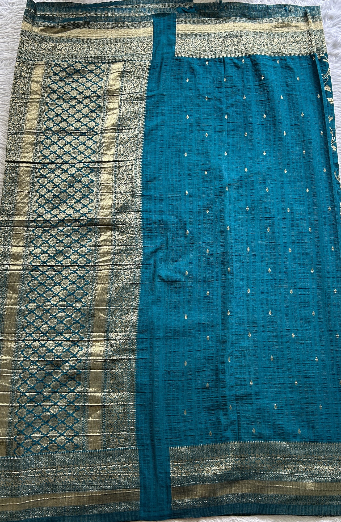 Semi Georgette Saree Turquoise Blue Colored Complemented with a Zari Border. - Sampradaya Designer Studio