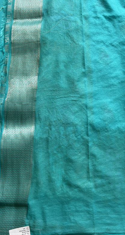 Semi Georgette Saree Sky Blue Colored Complemented with a Zari Border. - Sampradaya Designer Studio