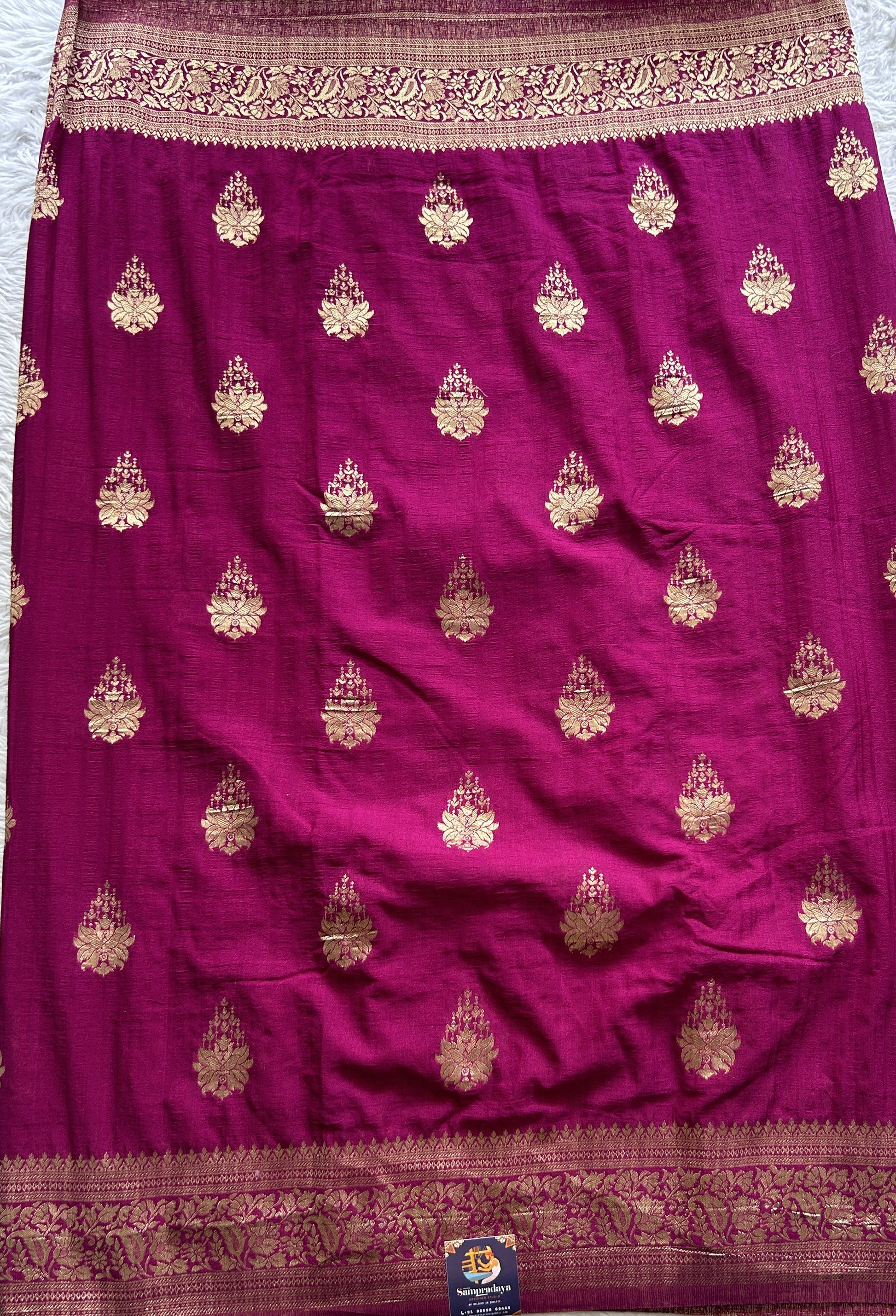 Semi Georgette Saree Dark Pink Colored Complemented with a Zari Border. - Sampradaya Designer Studio