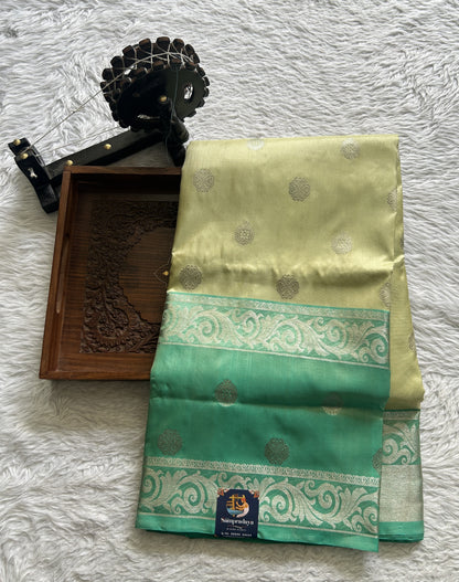 Venkatagiri Pattu Saree Pista Green Colored Complemented With a Zari Border - Sampradaya Designer Studio