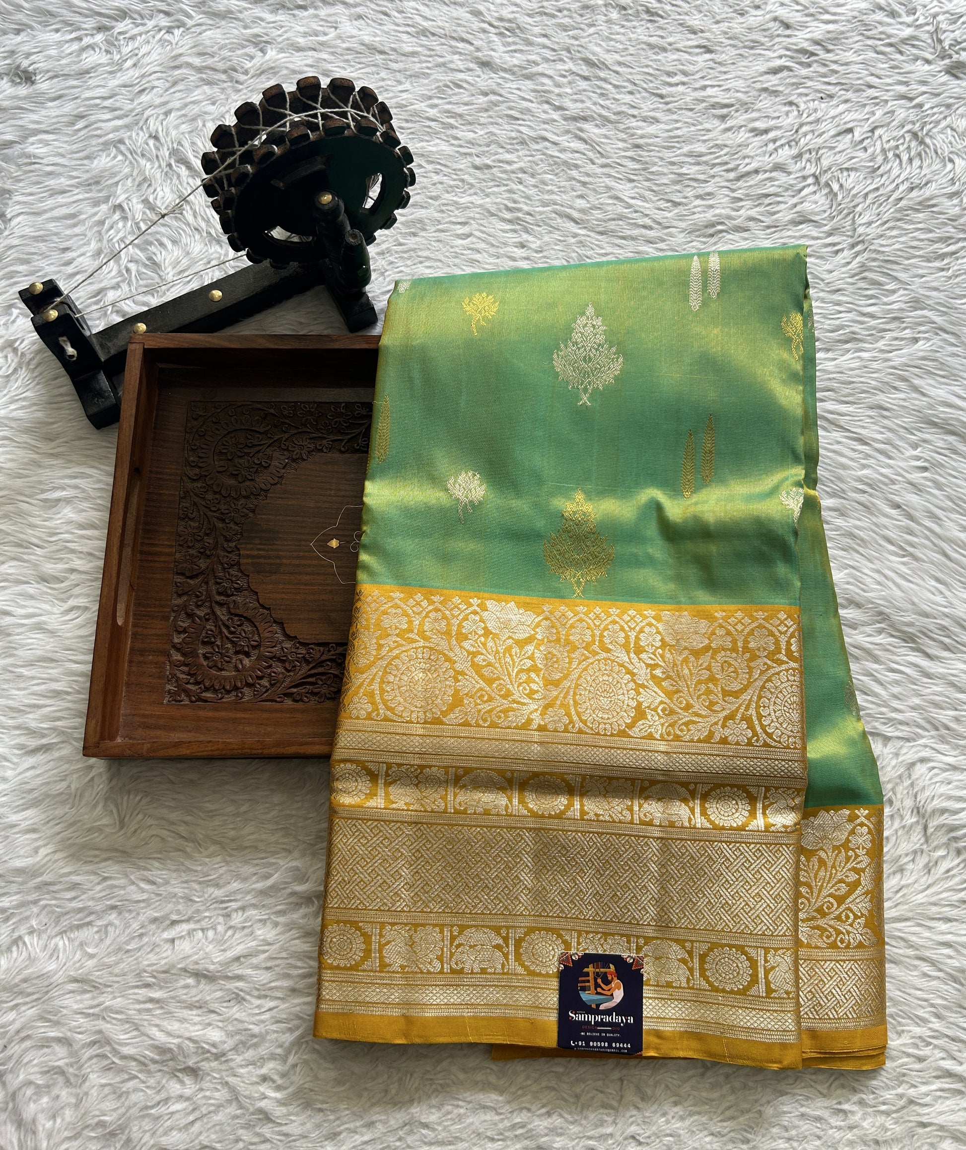 Venkatagiri Pattu Saree Light Green Colored Complemented With a Mustard Yellow Zari Border - Sampradaya Designer Studio