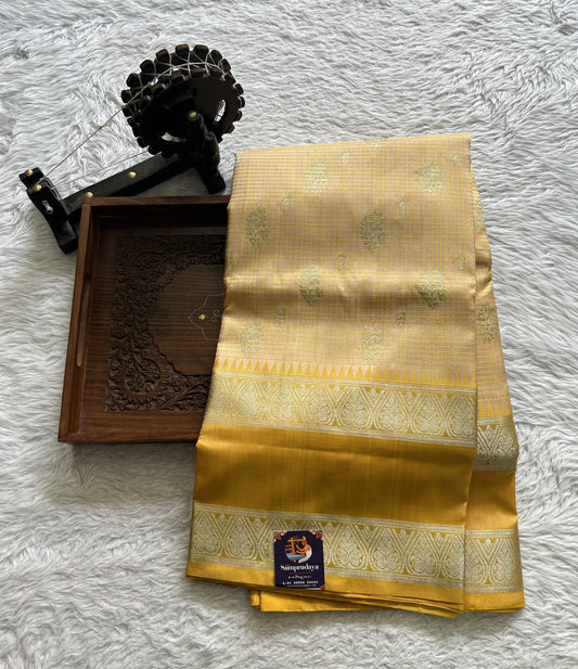 Venkatagiri Pattu Saree Light Yellow Colored Complemented With a Zari Border - Sampradaya Designer Studio