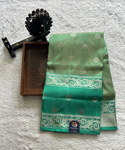 Venkatagiri Pattu Saree Pista Green Complemented With a Sea Green Color Zari Border - Sampradaya Designer Studio