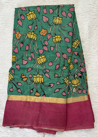 Pen Kalamkari Saree Rama Green colored allover saree complemented with a Onion Pink Colored Plain border - Sampradaya Designer Studio