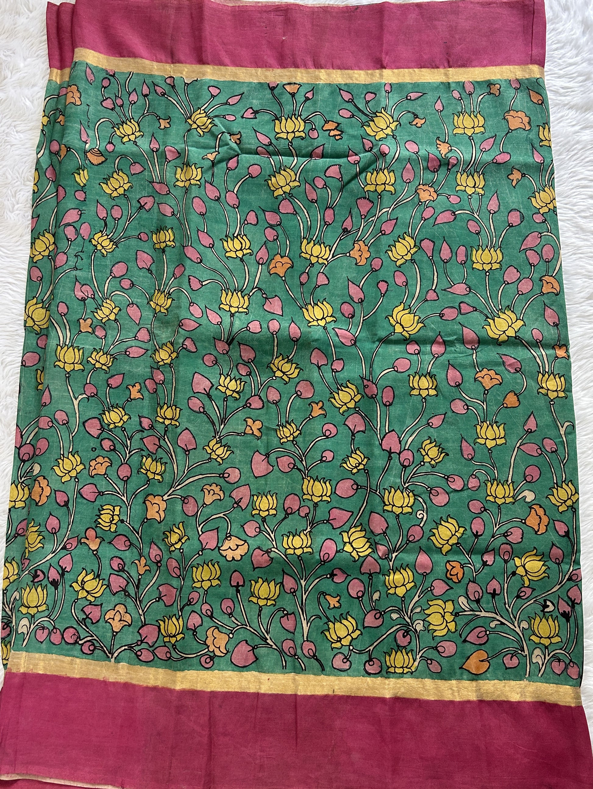 Pen Kalamkari Saree Rama Green colored allover saree complemented with a Onion Pink Colored Plain border - Sampradaya Designer Studio