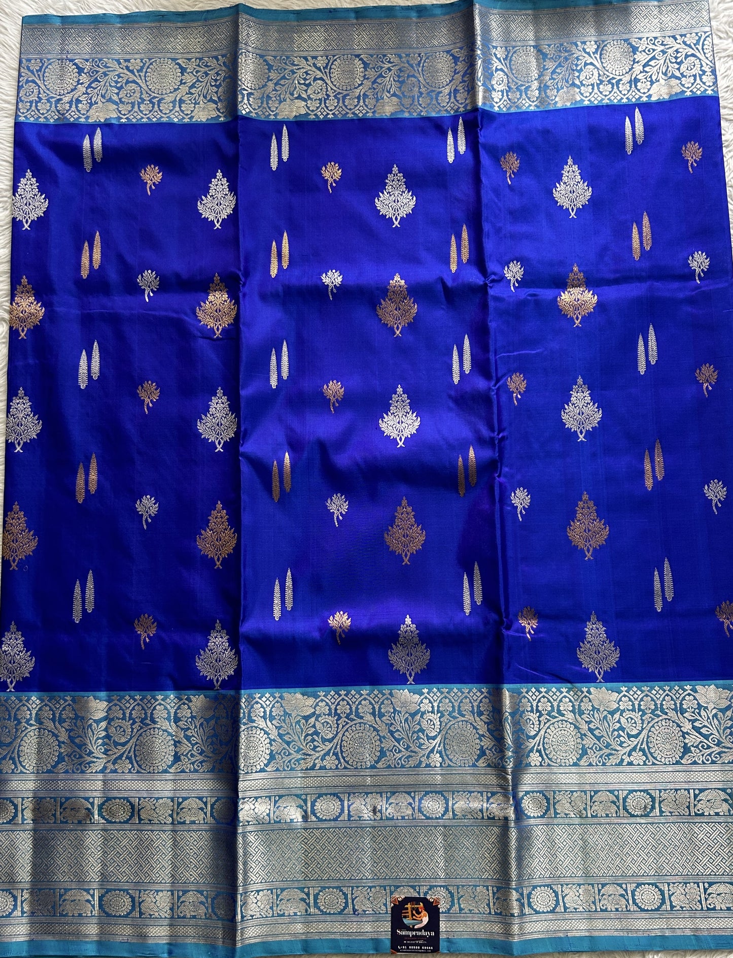 Venkatagiri Pattu Saree Cobalt Blue Complemented With a Sea Blue Color Zari Border - Sampradaya Designer Studio