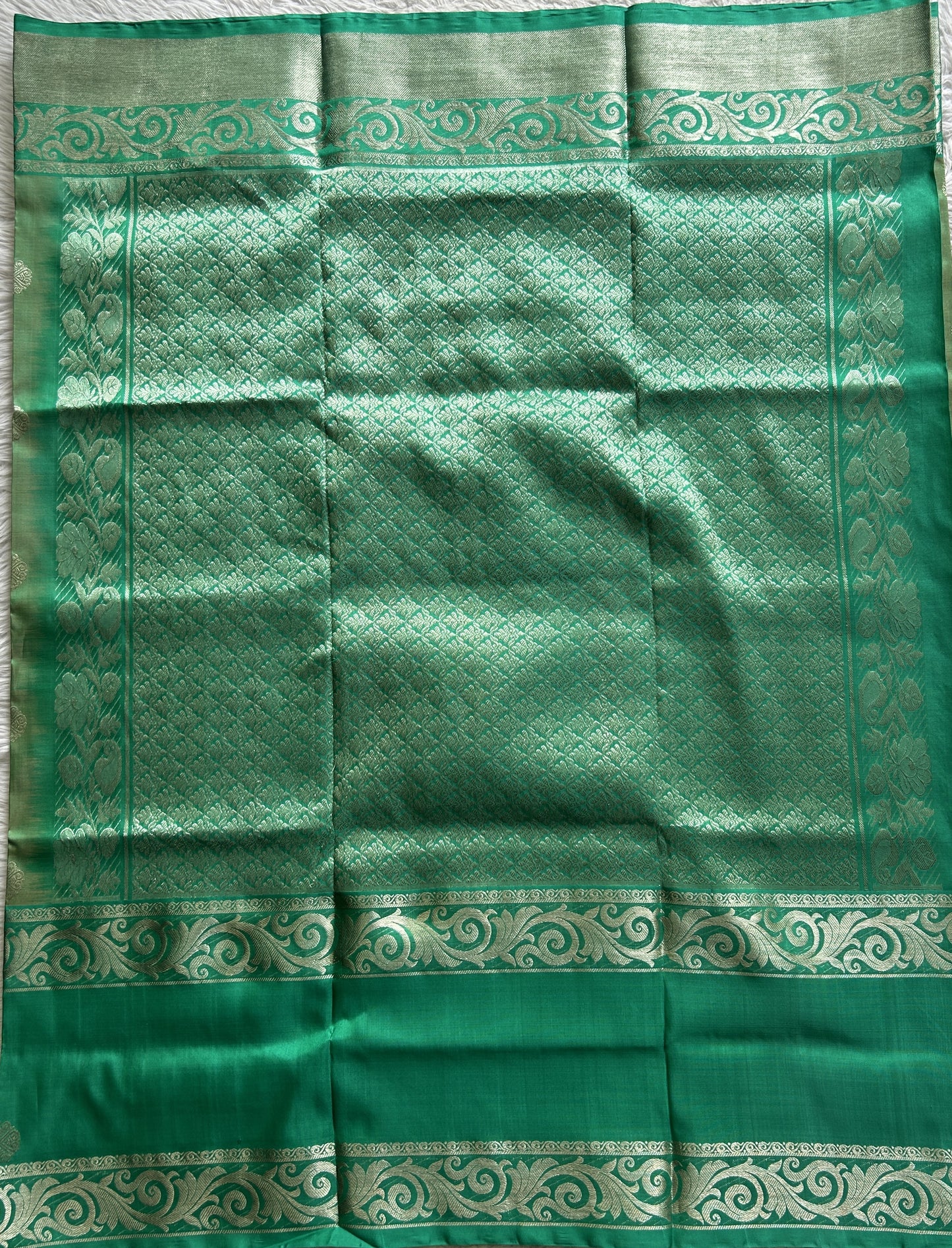 Venkatagiri Pattu Saree Pista Green Complemented With a Sea Green Color Zari Border - Sampradaya Designer Studio