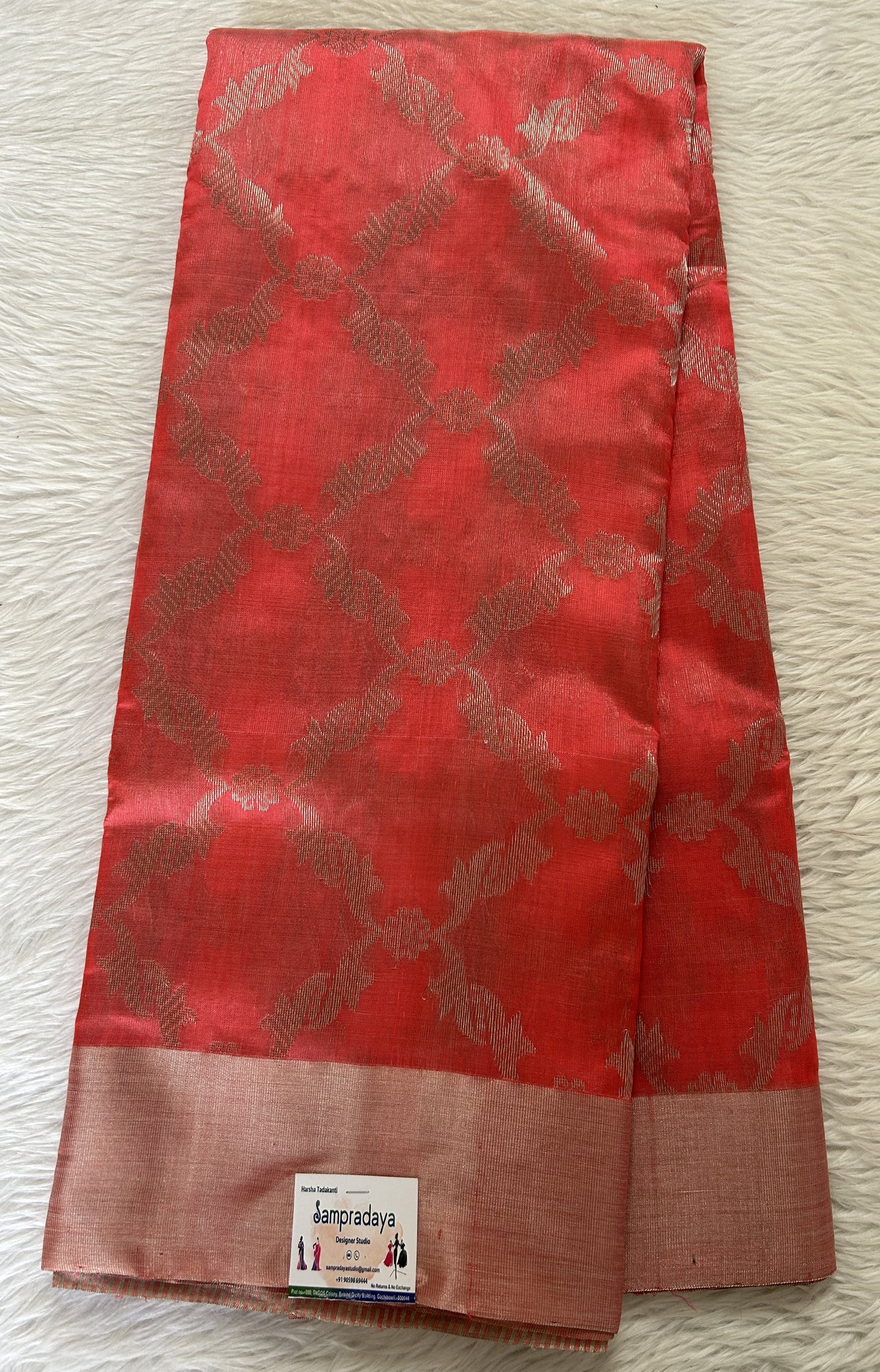 Chanderi Pattu Saree Coral colored saree complemented with a Silver Zari border - Sampradaya Designer Studio