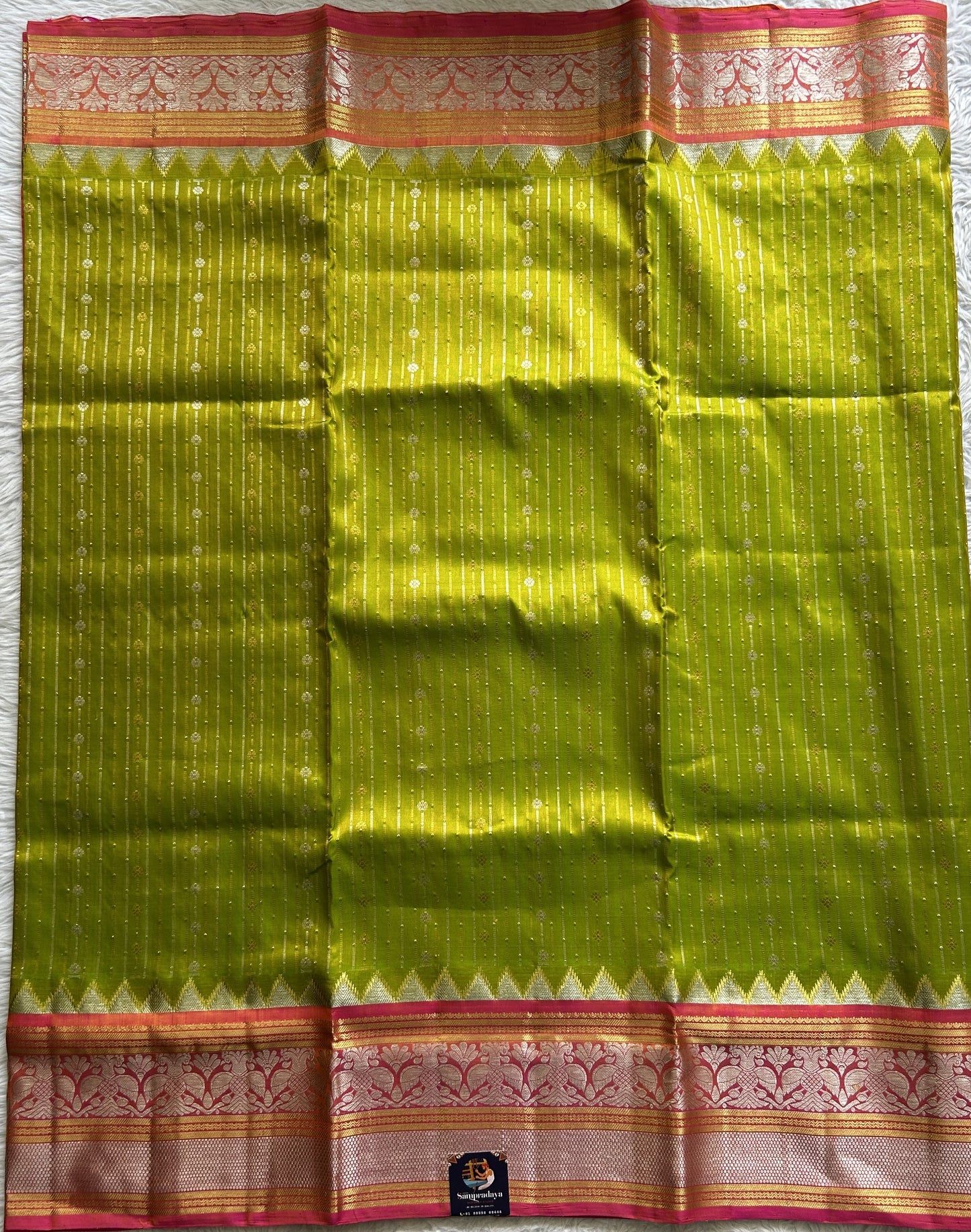 Venkatagiri Pattu Saree Fluorescent Green Colored Complemented With a Pink Color Zari Border - Sampradaya Designer Studio