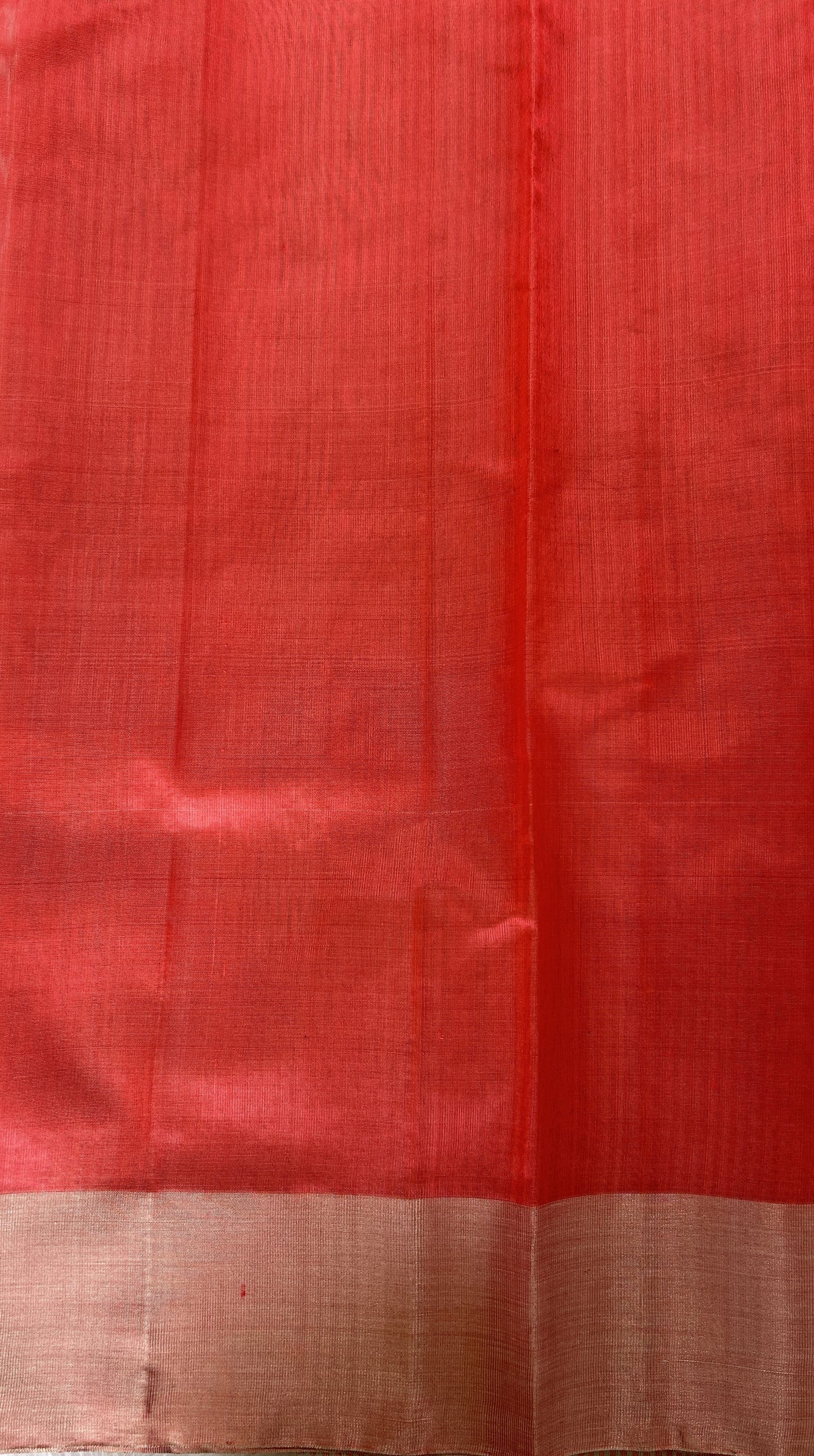 Chanderi Pattu Saree Coral colored saree complemented with a Silver Zari border - Sampradaya Designer Studio