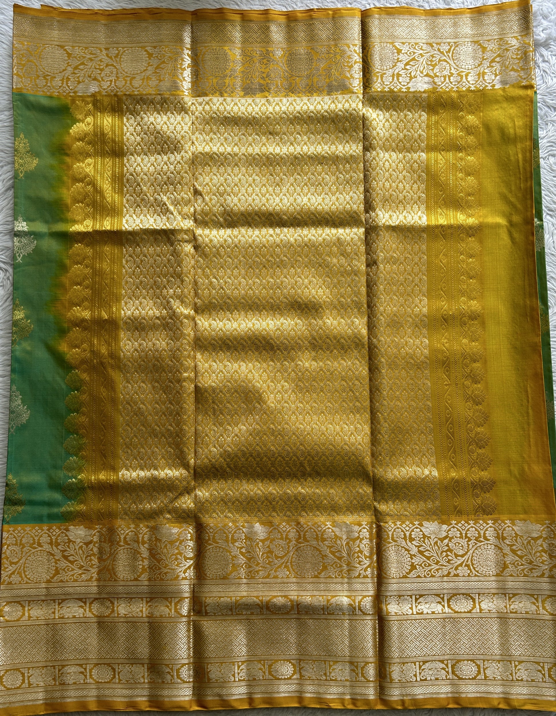 Venkatagiri Pattu Saree Light Green Colored Complemented With a Mustard Yellow Zari Border - Sampradaya Designer Studio