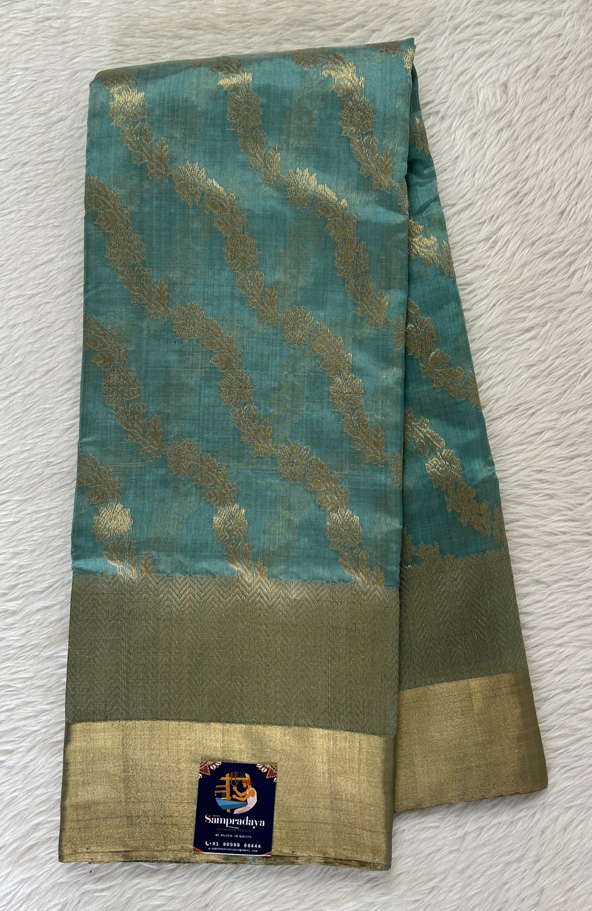 Chanderi Pattu Saree Sea Blue colored saree complemented with a Gold Zari border - Sampradaya Designer Studio