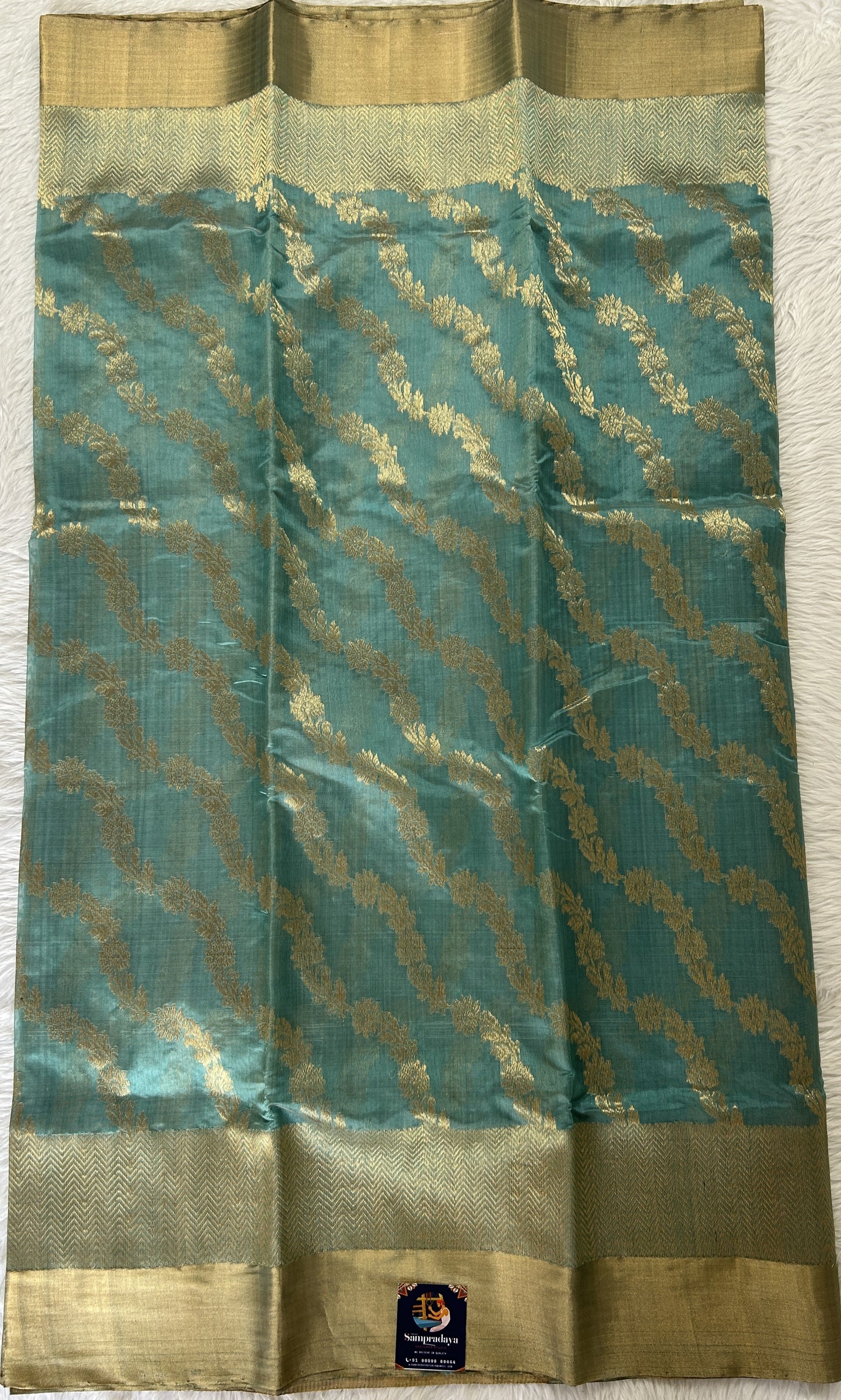 Chanderi Pattu Saree Sea Blue colored saree complemented with a Gold Zari border - Sampradaya Designer Studio