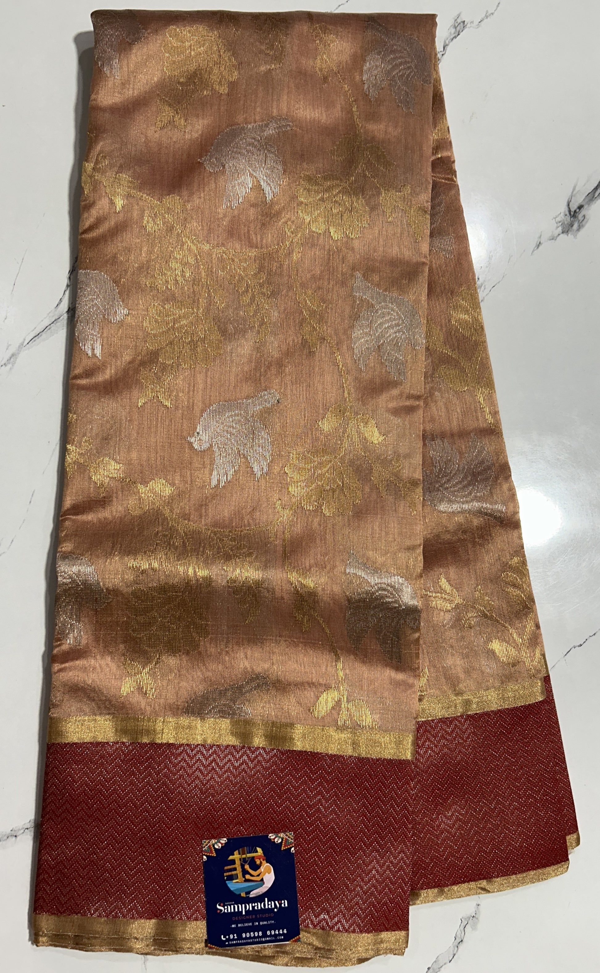 Chanderi Pattu Saree Light coral colored saree complemented with a Dark Red Colored Silver Zari border - Sampradaya Designer Studio