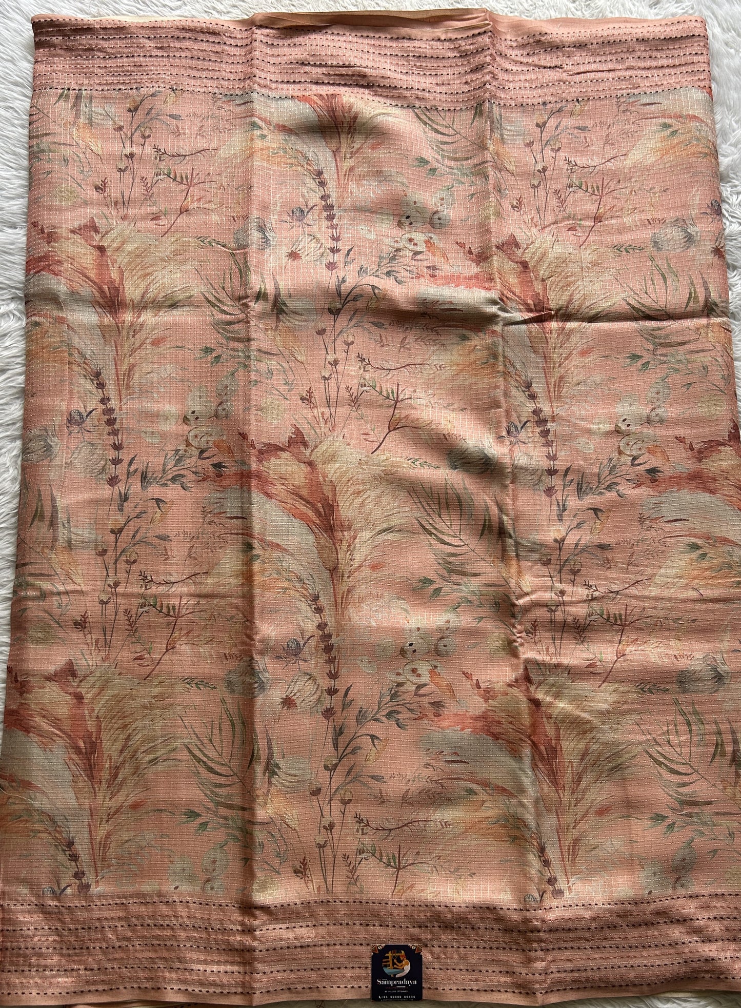 Semi Tussar Saree Peach Colored complemented with a Running Stich Border. - Sampradaya Designer Studio