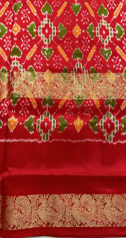 Ikkat Pattu Saree Off white colored Saree complemented with a Red Colored Ikkat Kanchi border. - Sampradaya Designer Studio