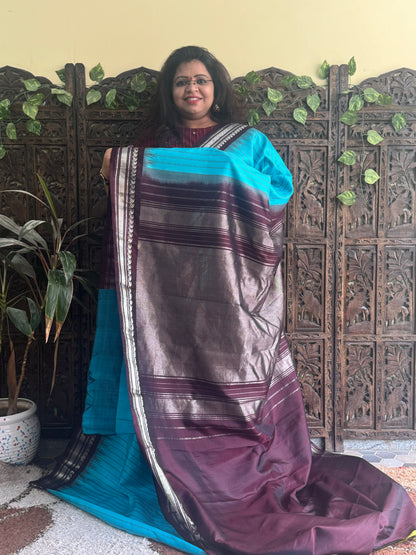 Gadwal Silk Saree Sky Blue Colored Complemented With a Brown Zari Border