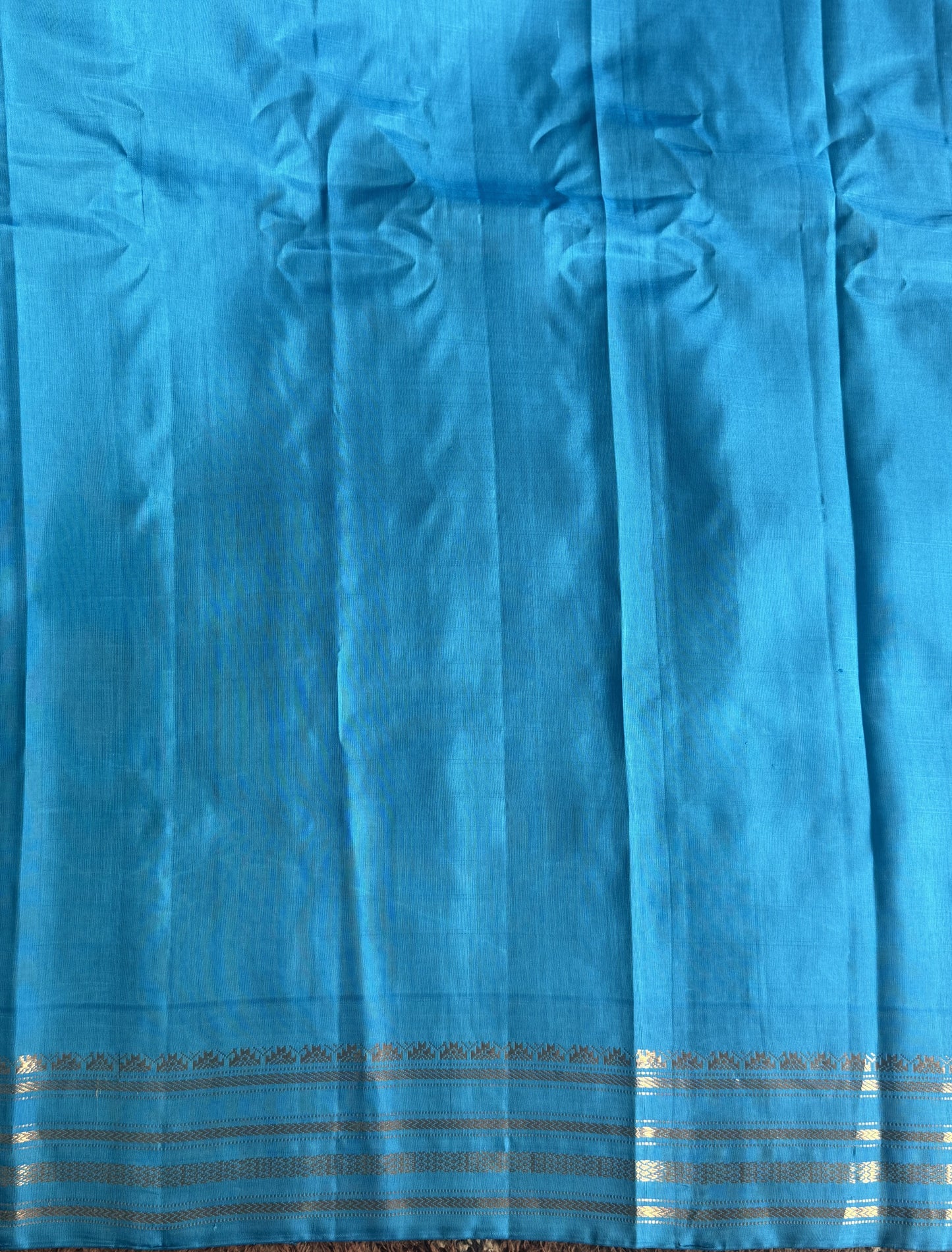 Gadwal Silk Saree Macaroon Colored Complemented With a Blue Zari Border