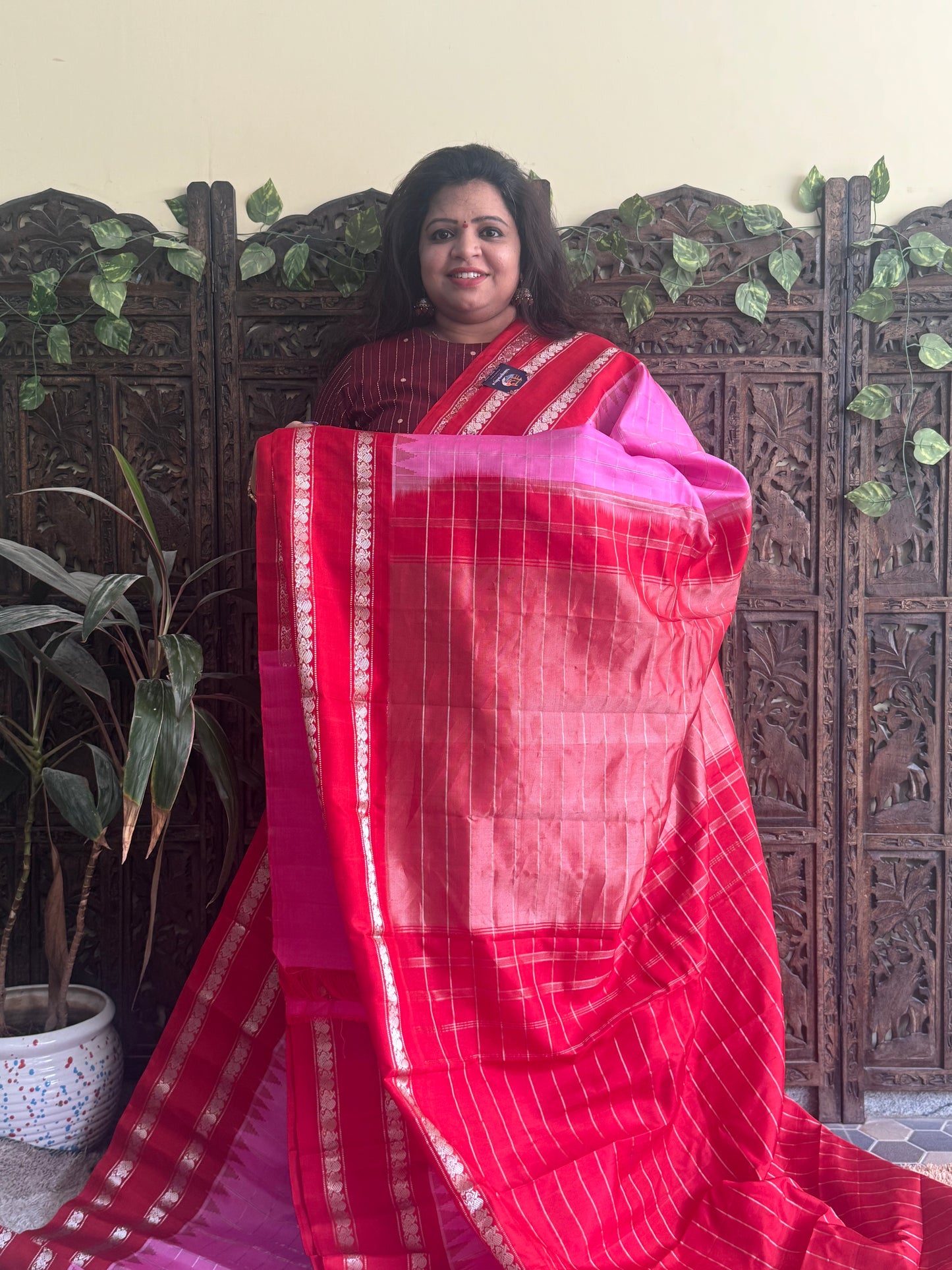 Gadwal Silk Saree Pink Colored Complemented With a Red Zari Border