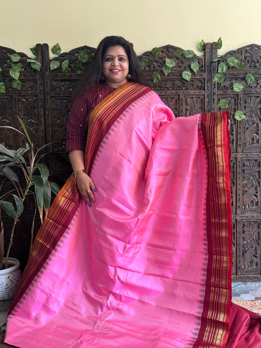 Gadwal Silk Saree Pink Colored Complemented With a Maroon Zari Border